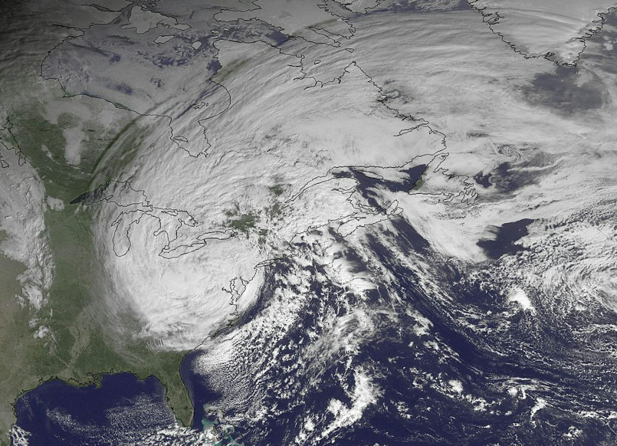 This NOAA satellite image taken Tuesday, Oct. 30, 2012, shows superstorm Sandy slowly moving westward while weakening across southern Pennsylvania. The National Weather Service said a foot and more of snow was reported in lower elevations of West Virginia, where most towns and roads are. High elevations in the mountains were getting more than two feet and a blizzard warning for more than a dozen counties was in effect until Wednesday afternoon.