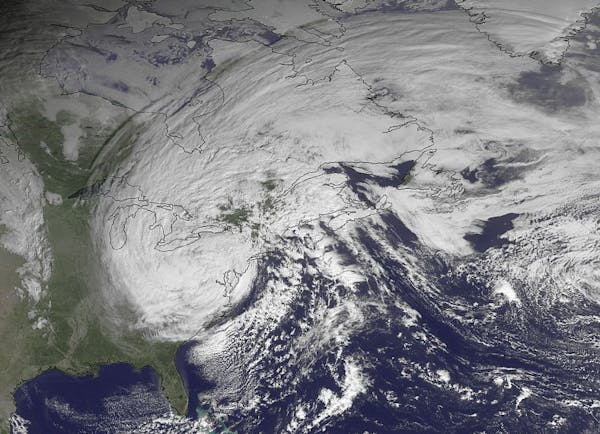 This NOAA satellite image taken Tuesday, Oct. 30, 2012, shows superstorm Sandy slowly moving westward while weakening across southern Pennsylvania. Th