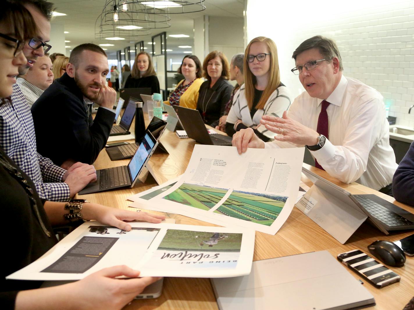 Land O'Lakes President and CEO Chris Policinski, third from right, met with the company's communications staff Feb. 23, 2017, in Arden Hills.