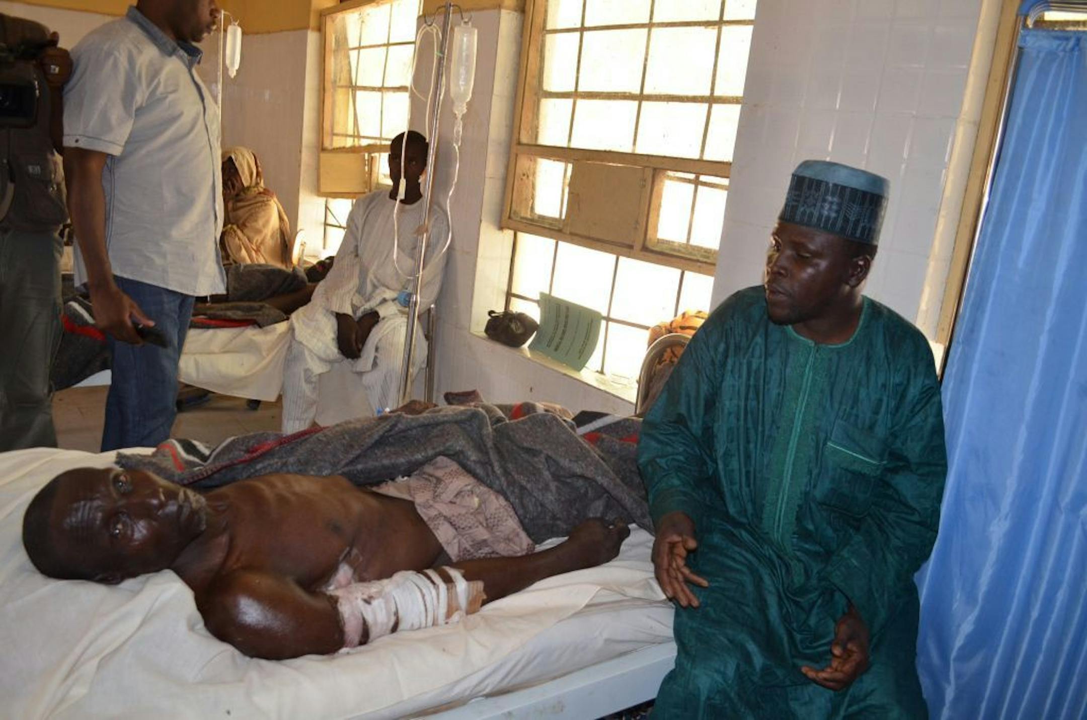 A man received treatment at Konduga specialist hospital, following an attack on a a weekly market by suspected Boko Haram Islamic extremists in Kawuri, Maiduguri, Nigeria, Tuesday, Jan. 28, 2014.