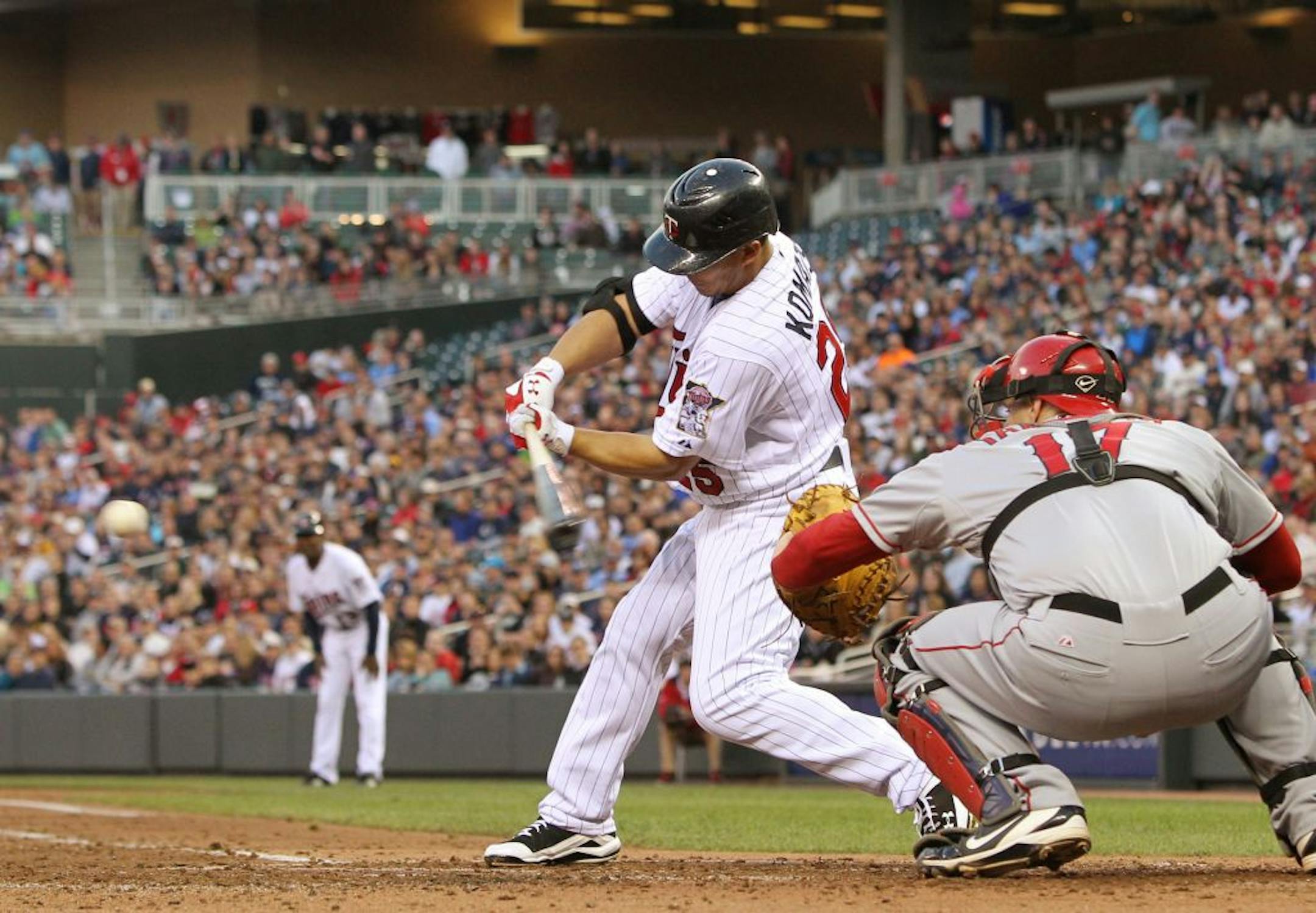 Outfielder Erik Komatsu, who wasn't with the Twins when they got no-hit last week by Jered Weaver, ended Weaver's hitless string against them with this third-inning single Monday.