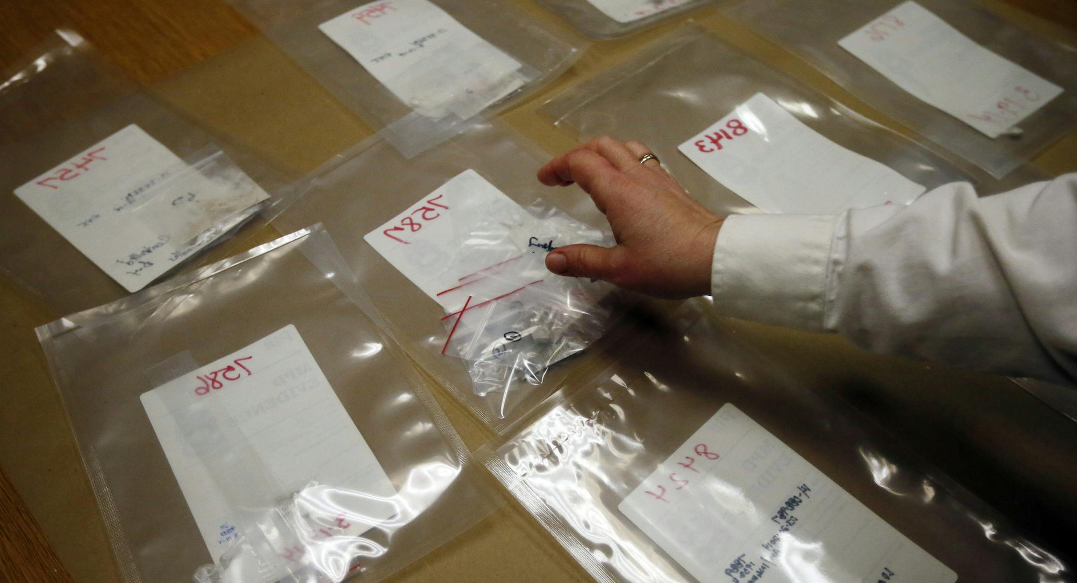 Samples of heroin in the Minneapolis police evidence room. Overdose deaths from heroin and other opiates have risen sharply, too, with 69 people killed in Hennepin County in the first half of 2013; 84 died in all of 2012.