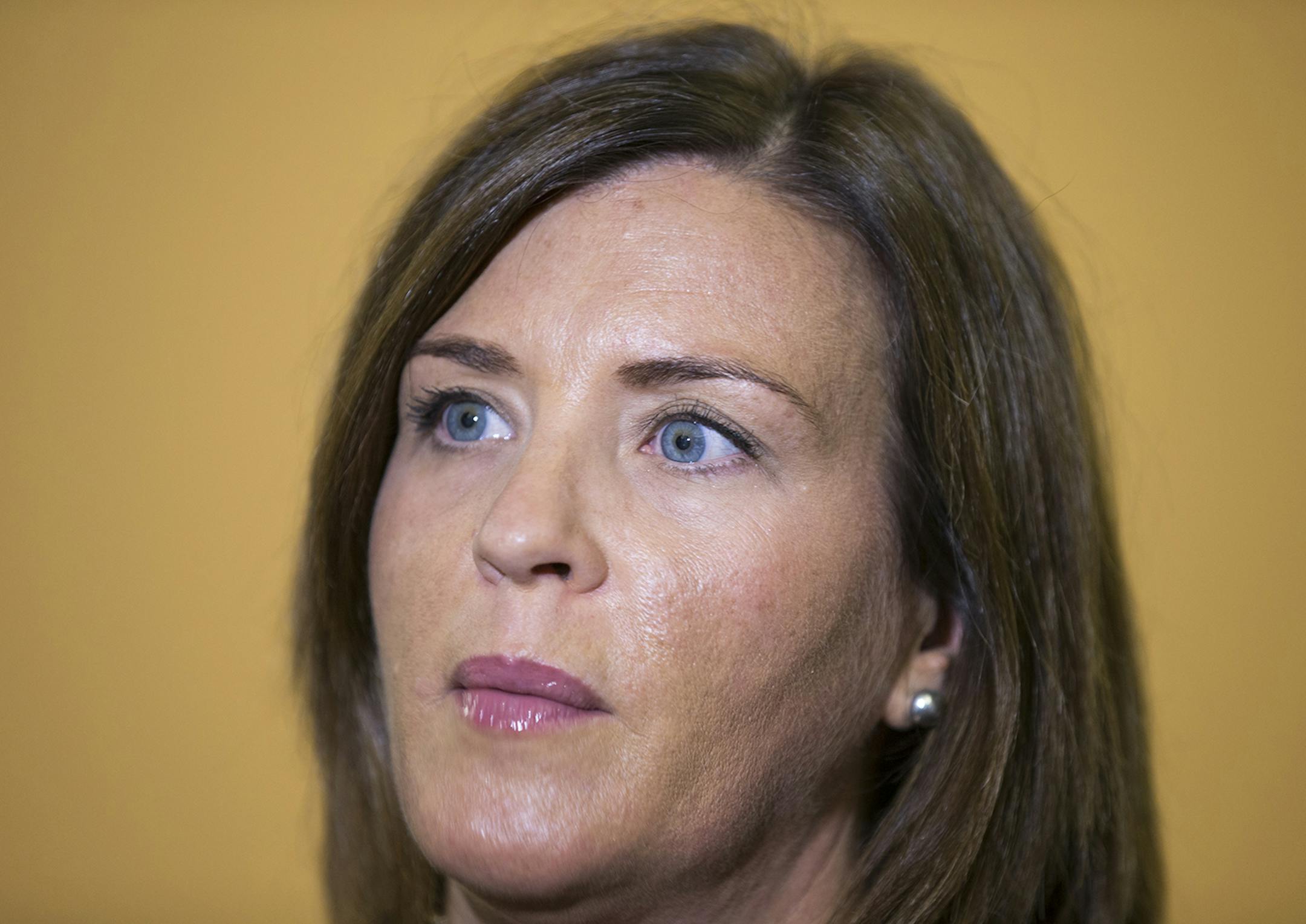 MNsure CEO Allison O'Toole speaks to the media inside the MNsure customer contact center in St. Paul on Wednesday, October 28, 2015. ] (LEILA NAVIDI/STAR TRIBUNE) leila.navidi@startribune.com BACKGROUND INFORMATION: Preparations for MNsure open enrollment are underway. Open enrollment starts November 1.