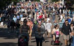 People walked up Judson Avenue at the Minnesota State Fair on Thursday morning, Aug. 22, 2019, before the crowds got too thick.
