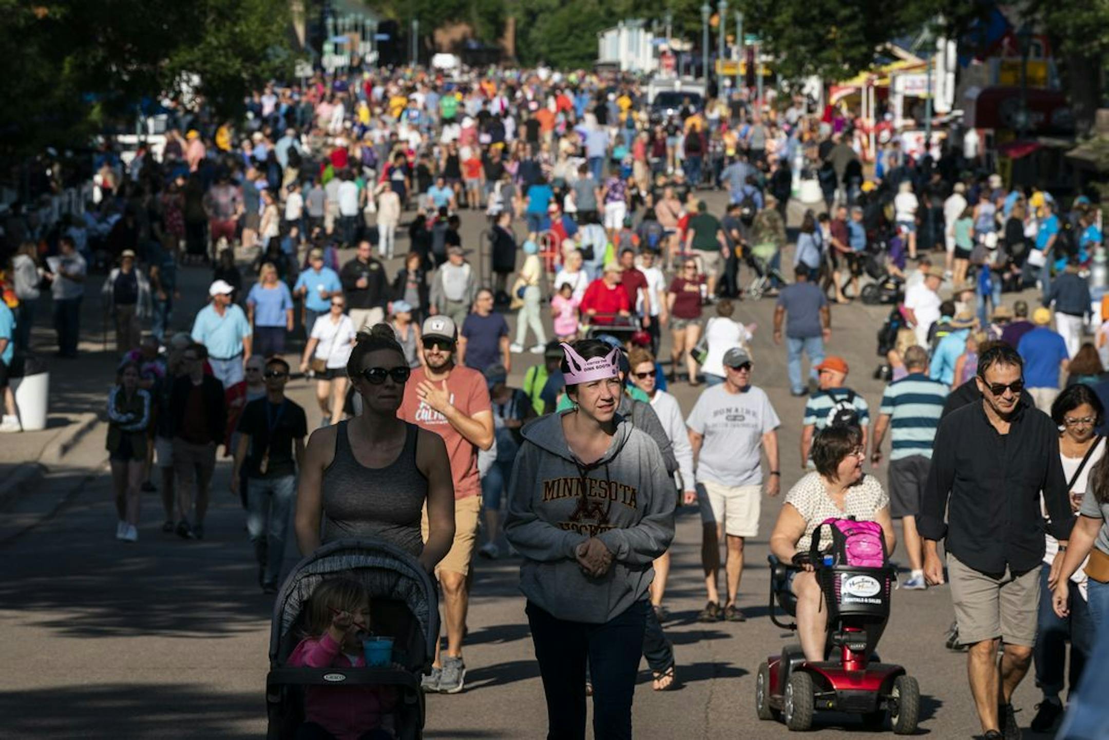 People walked up Judson Avenue at the Minnesota State Fair on Thursday morning, Aug. 22, 2019, before the crowds got too thick.