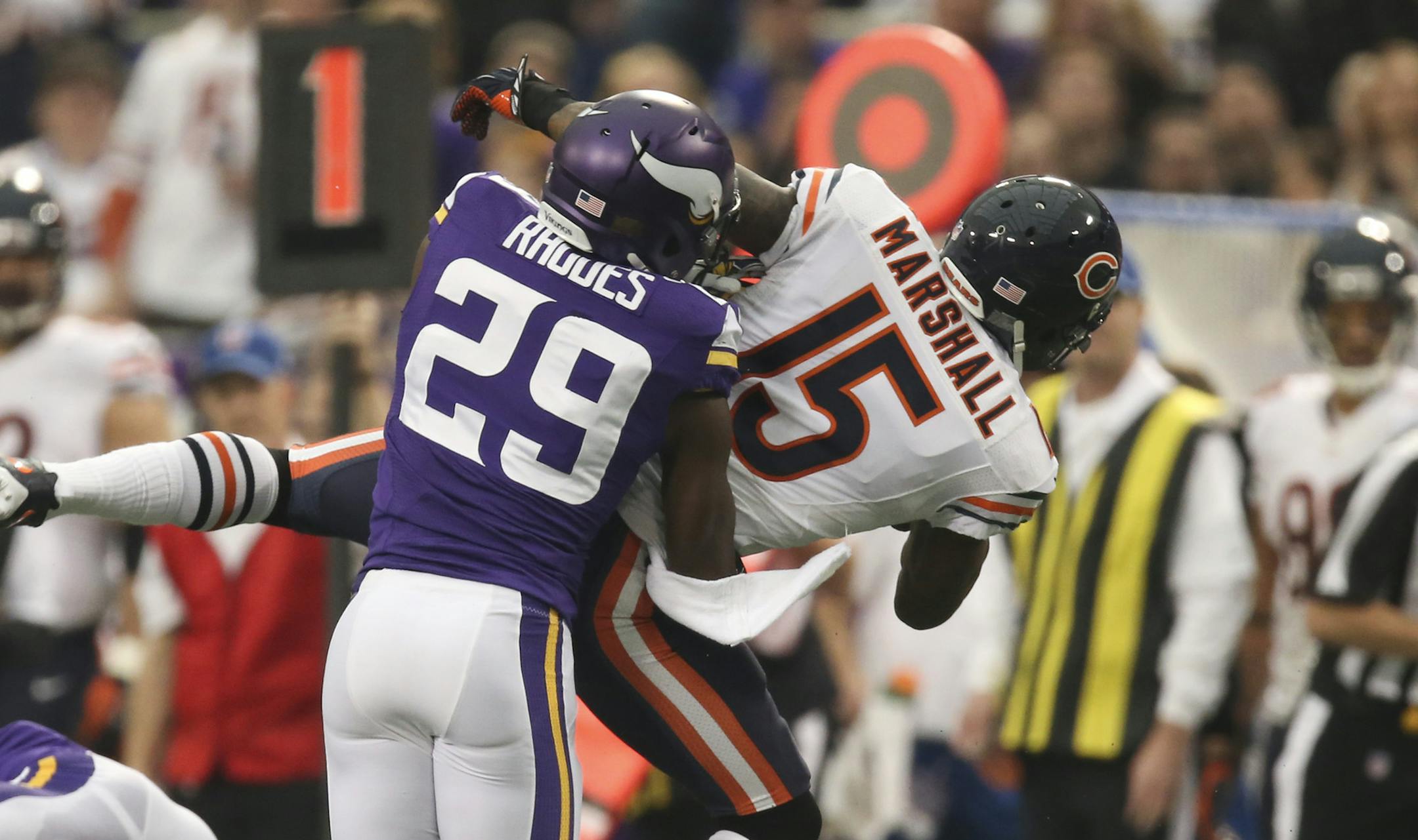 The Minnesota Vikings eeked out a 23-20 overtime win over the Chicago Bears in an NFL football game Sunday afternoon, December 1, 2013 and Mall of America Field in Minneapolis. Minnesota Vikings cornerback Xavier Rhodes (29) tackled Chicago Bears wide receiver Brandon Marshall (15) after he gained 15 yards in the second quarter. ] JEFF WHEELER &#x201a;&#xc4;&#xa2; jeff.wheeler@startribune.com