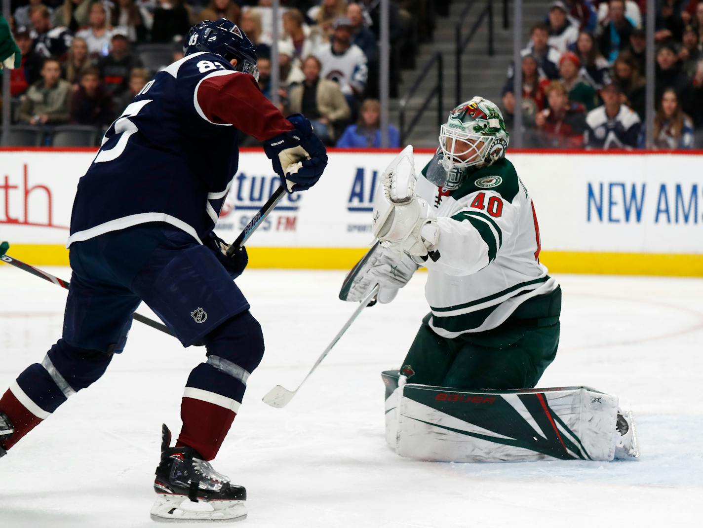 Wild goaltender Devan Dubnyk made a glove save duting a game against Colorado in December.