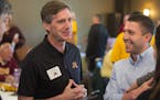 U of M athletic director Mark Coyle, on his second day on his new job, makes his first public appearance at the Crow River Country Club in Hutchinson,