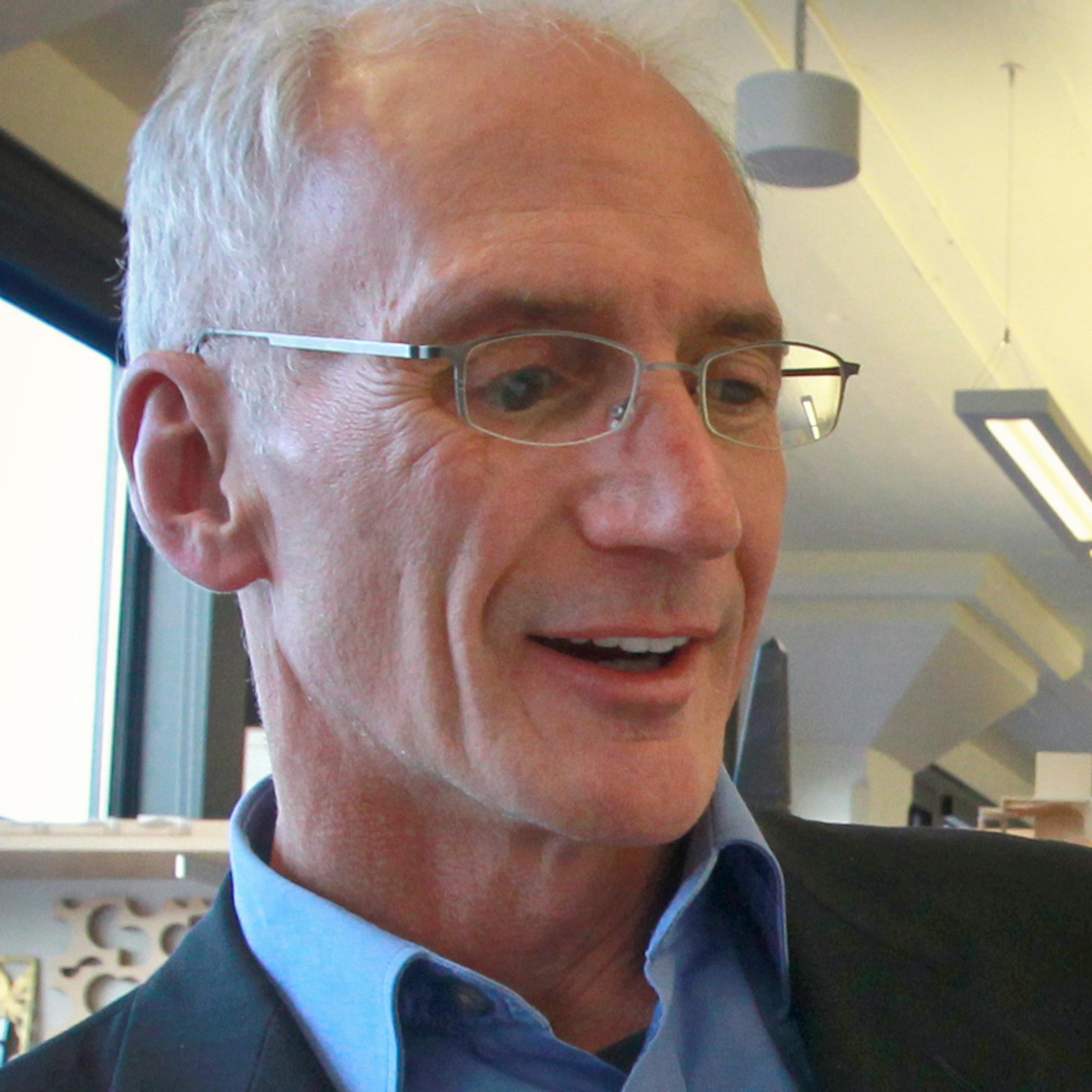 In the HGA Work space, John Cook talks about making the designs work for Joan's Project, in downtown minneapolis. _ [ TOM WALLACE • twallace@startribune.com _ Assignments #20026676A_ Dec 13, 2012_ SLUG: aoty1230_ EXTRA INFORMATION: Portrait of Joan ORG XMIT: MIN1211121424250028