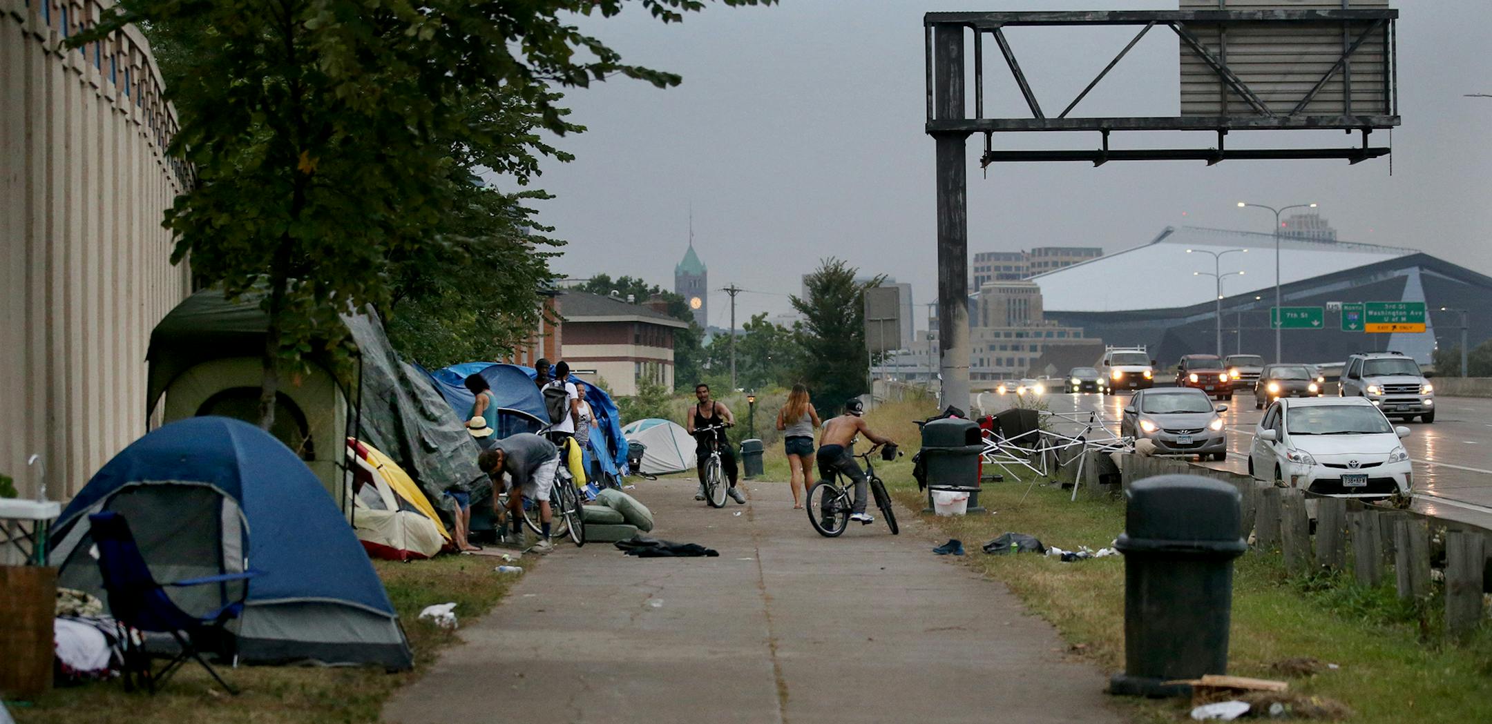 An American Indian encampment in south Minneapolis continues to grow and now includes several families with children. Some have come hoping to receive services that might end their homelessness. Here, the skies darken as a rain storm approaches Monday, Aug. 27, 2018, in Minneapolis, MN.] DAVID JOLES ï david.joles@startribune.com Homeless families at the American Indian encampment in south Minneapolis**Koda Deer,cq