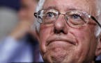 Former Democratic presidential candidate, Sen. Bernie Sanders, I-Vt., waits before asking that Hillary Clinton become the unanimous choice for Preside