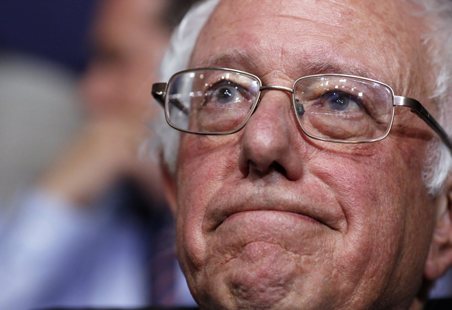 Former Democratic presidential candidate, Sen. Bernie Sanders, I-Vt., waits before asking that Hillary Clinton become the unanimous choice for President of the United States with the Vermont delegation during the second day session of the Democratic National Convention in Philadelphia, Tuesday, July 26, 2016.