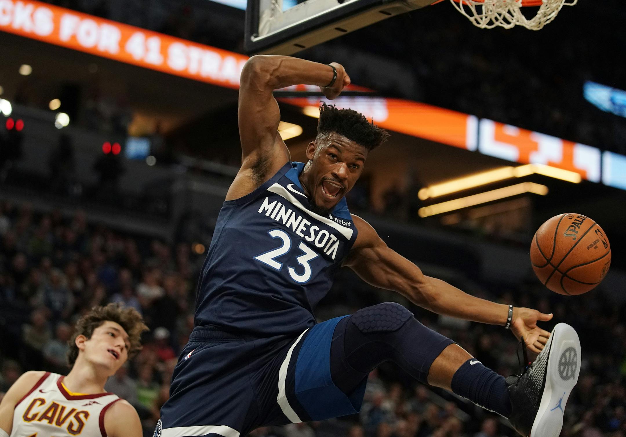 Minnesota Timberwolves guard Jimmy Butler (23) dunked the ball in the first half. ] ANTHONY SOUFFLE • anthony.souffle@startribune.com The Minnesota Timberwolves played the Cleveland Cavaliers in their NBA season home opener Friday, Oct. 19, 2018 at the Target Center in Minneapolis.