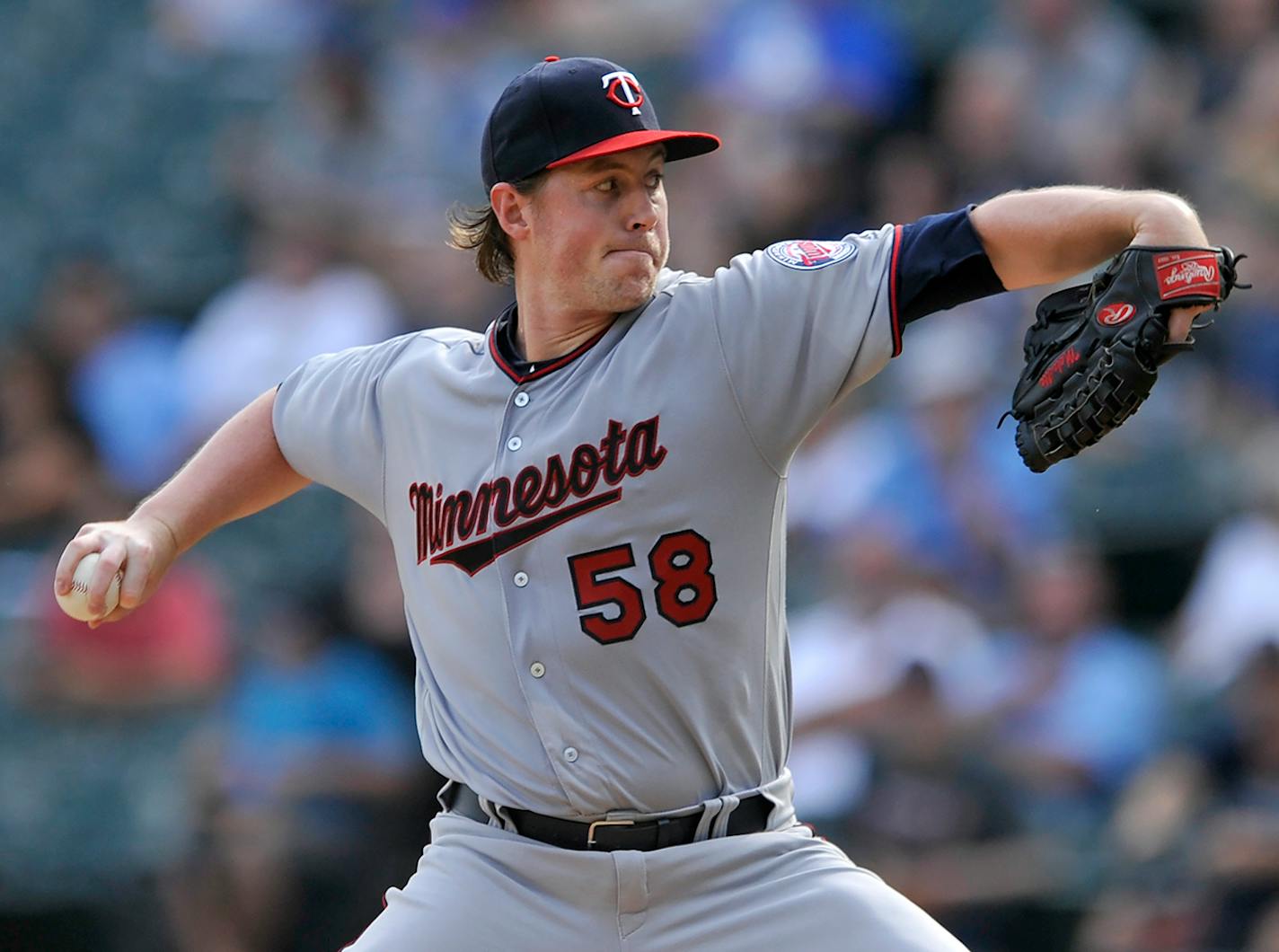 Minnesota Twins starter Tim Melville delivers a pitch during the first inning of game one of a baseball double header against the Chicago White Sox Monday, Aug. 21, 2017, in Chicago.