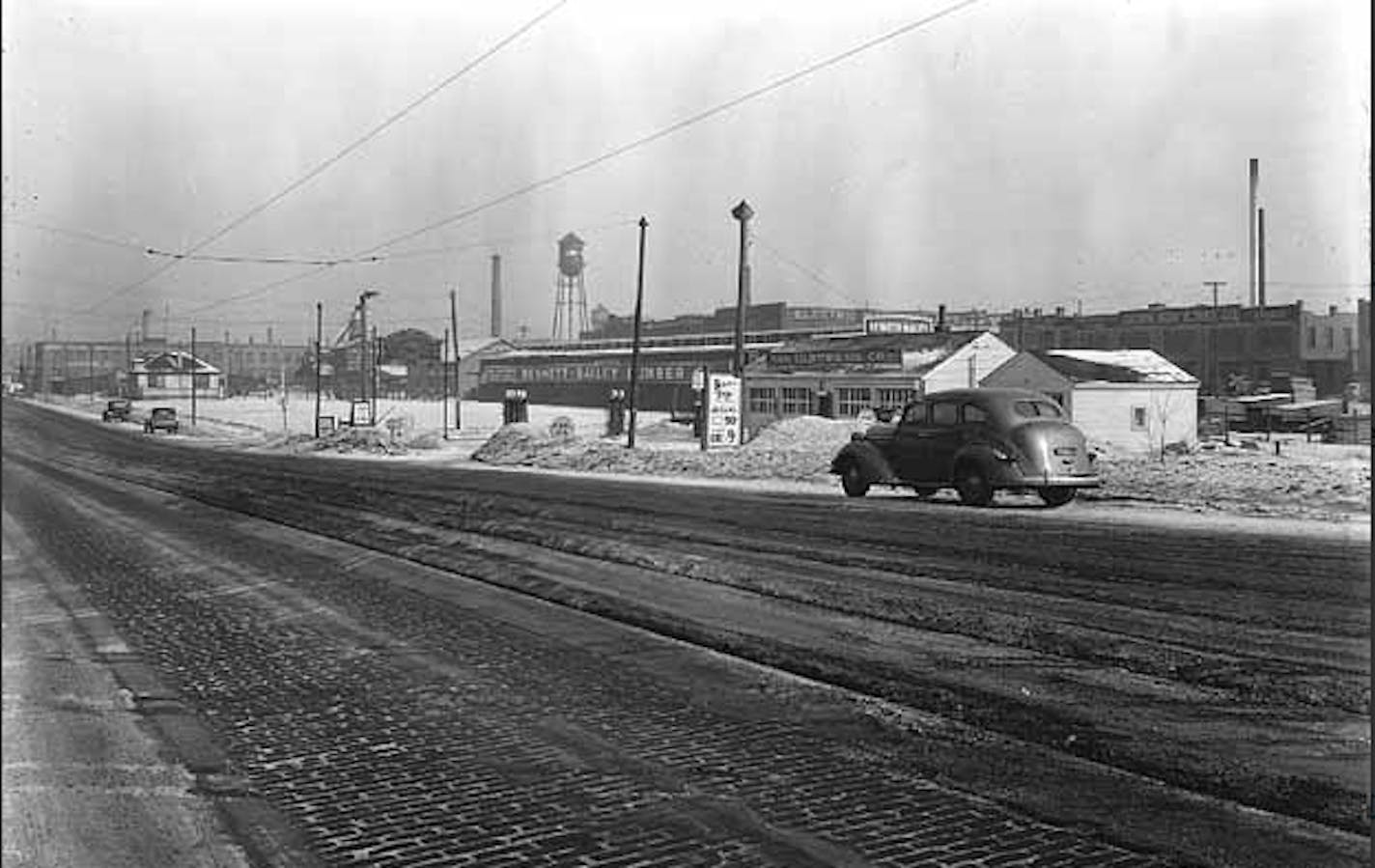 Central Avenue N.E. at the sight of a predecessor company to the-closing Youngblood Lumber was an industrial expanse in 1936. Photo: Minnesota Historical Society