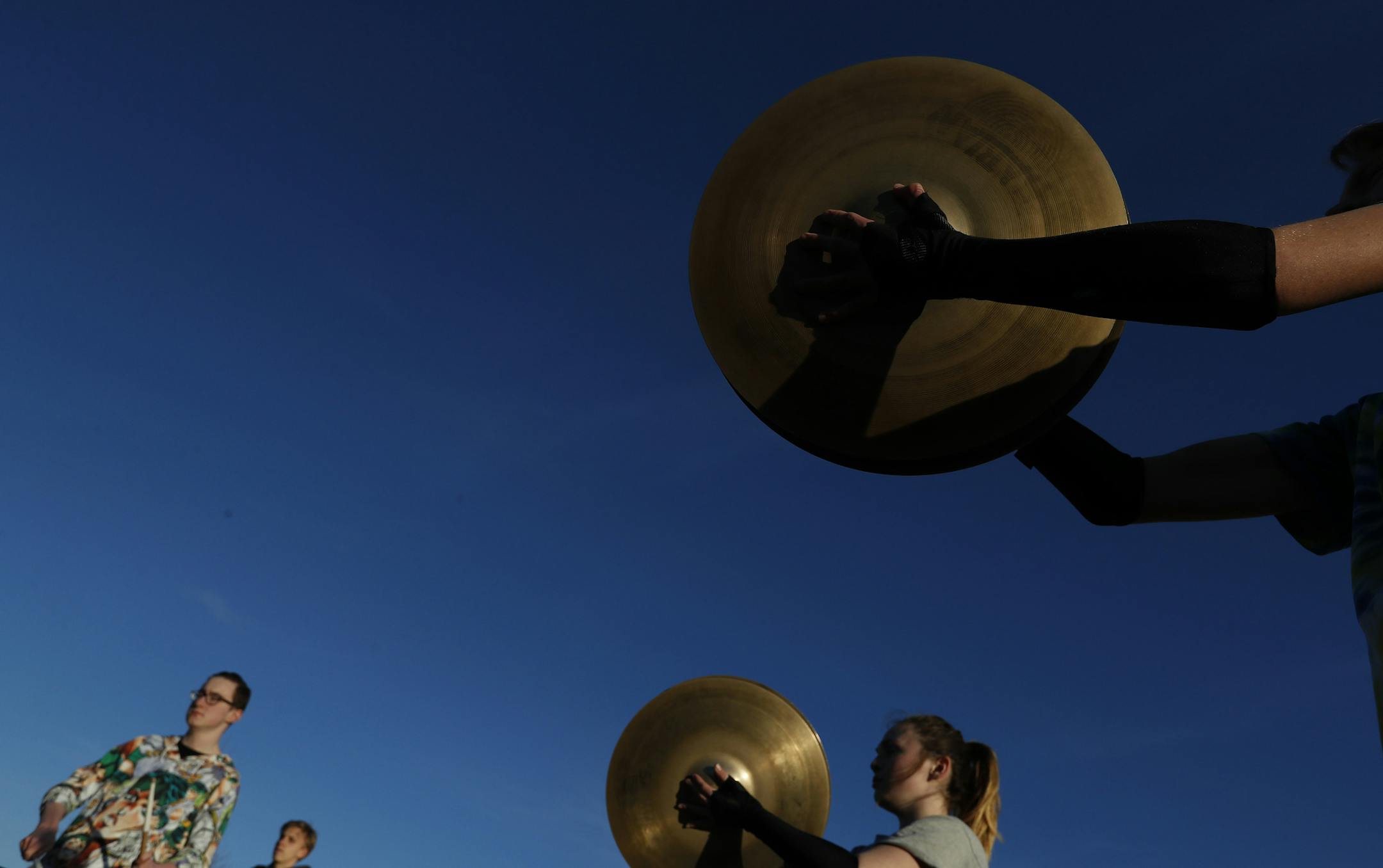 The Eden Prairie Drumline practiced outdoors on the first day of spring. ] CARLOS GONZALEZ &#xef; cgonzalez@startribune.com - March 20, 2017, Eden Prairie, MN, feature on popularity and growing competitive of prep drumlines and color guards, Eden Prairie High School Prep drum line practice