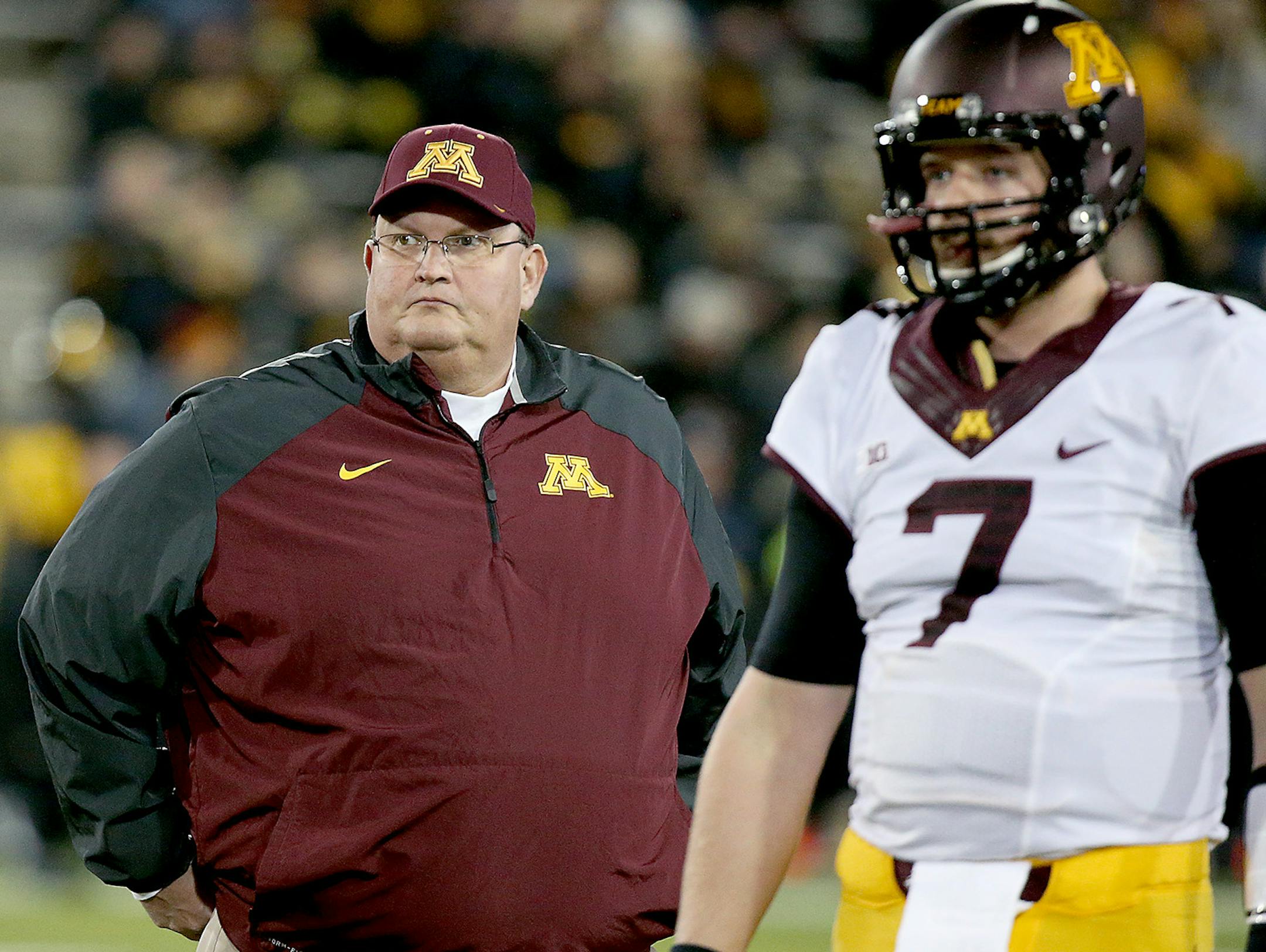 Gophers football coach Tracy Claeys and quarterback Mitch Leidner
