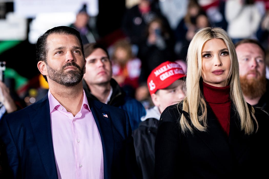 Donald Trump Jr. and Ivanka Trump looked on as their father, then-President Donald Trump, spoke at a rally in Dalton, Ga., on Jan. 4, 2020.