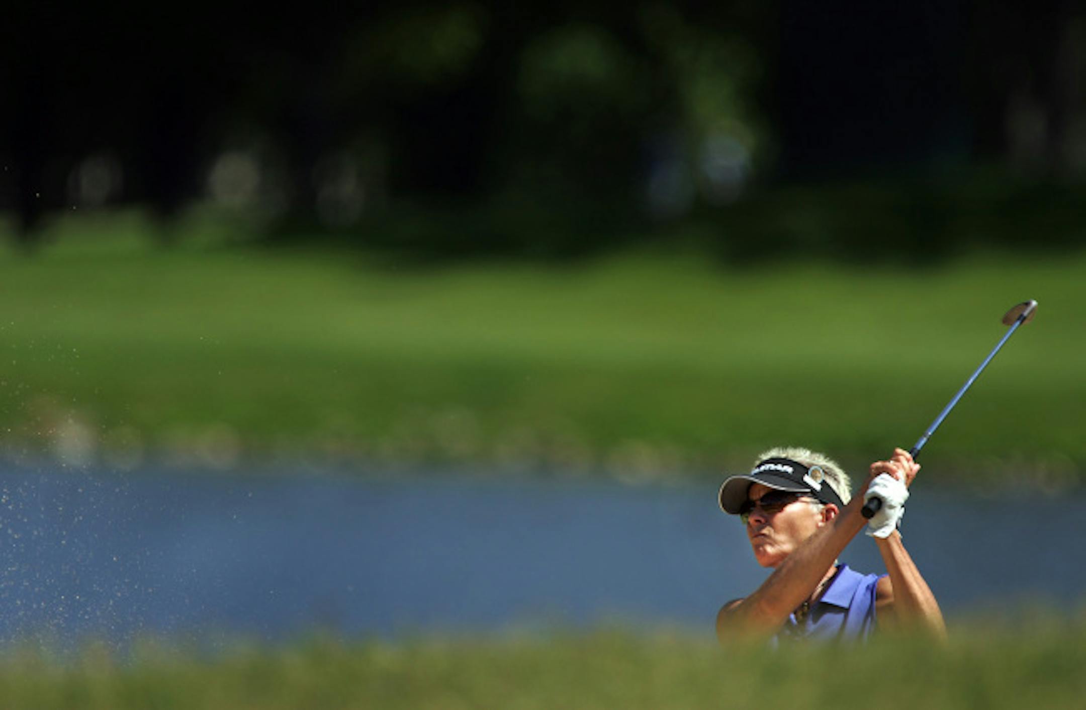 U.S. Women's Open competitor Martha Nause, a golf coach at Macalester College, approached the 18th green during a practice round at Interlachen Country Club.