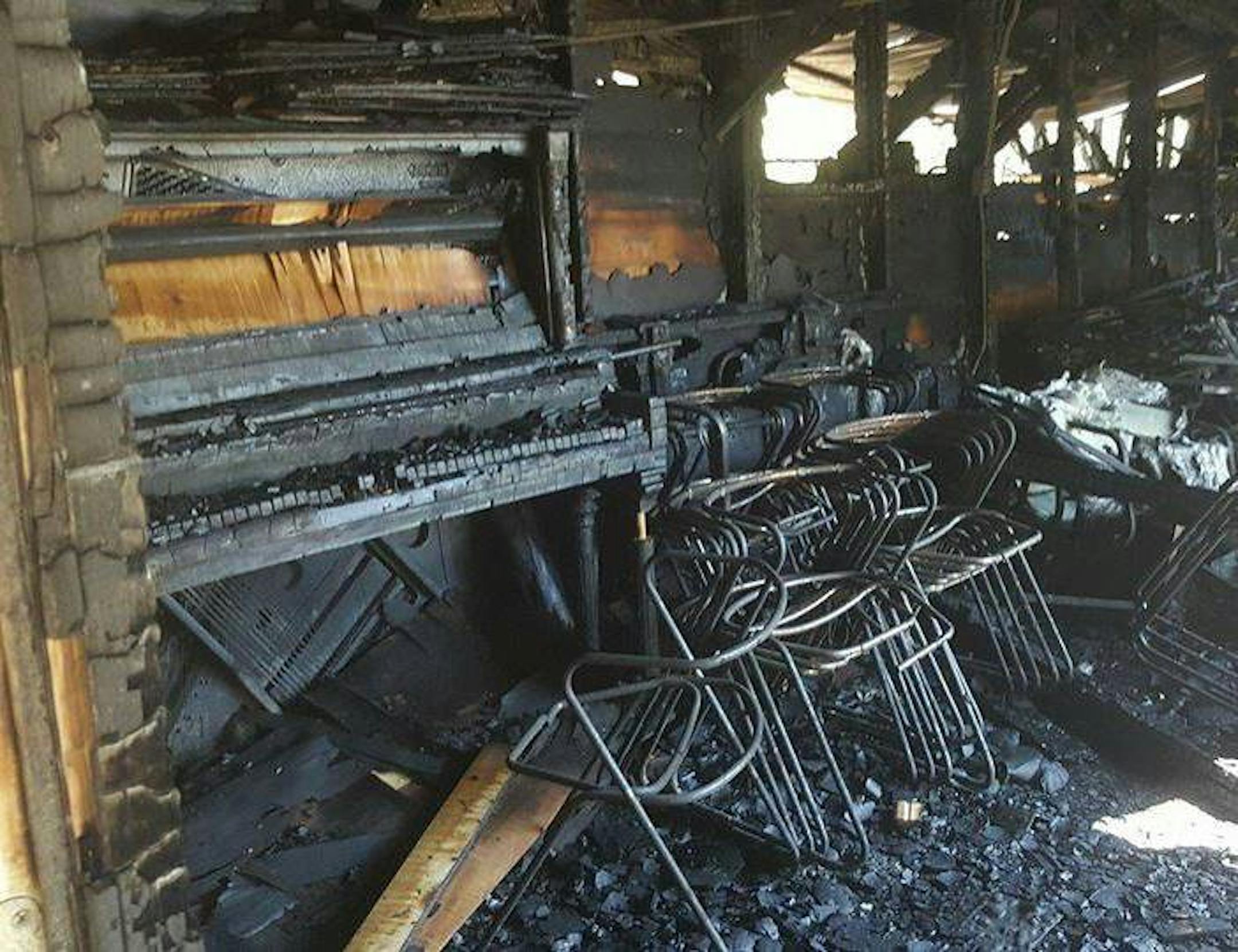 Charred remains of Sherburne County camp building. ORG XMIT: bmyhxfdzD_ADnH3OtzGu