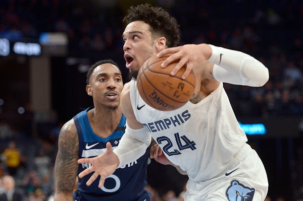 Grizzlies guard Dillon Brooks, who scored a game-high 28 points, drove past Timberwolves guard Jeff Teague during the second half Tuesday.