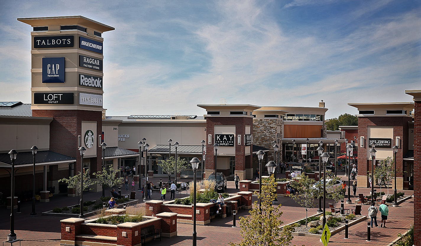 Twin Cities Premium Outlets is celebrating its 1st anniversary. Indications are that the Twin Cities' newest outlet mall has been a big success. ] JIM GEHRZ &#xef; james.gehrz@startribune.com / Eagan, MN / September 19, 2015 / 3:30 PM &#xf1; BACKGROUND INFORMATION: Showing the mall with shoppers in the common areas. Possibly showing exterior shots of popular stores such as Coach, UnderArmour, Saks. Lawler said that someone will need to accompany the shooter and there will definitely be someone t