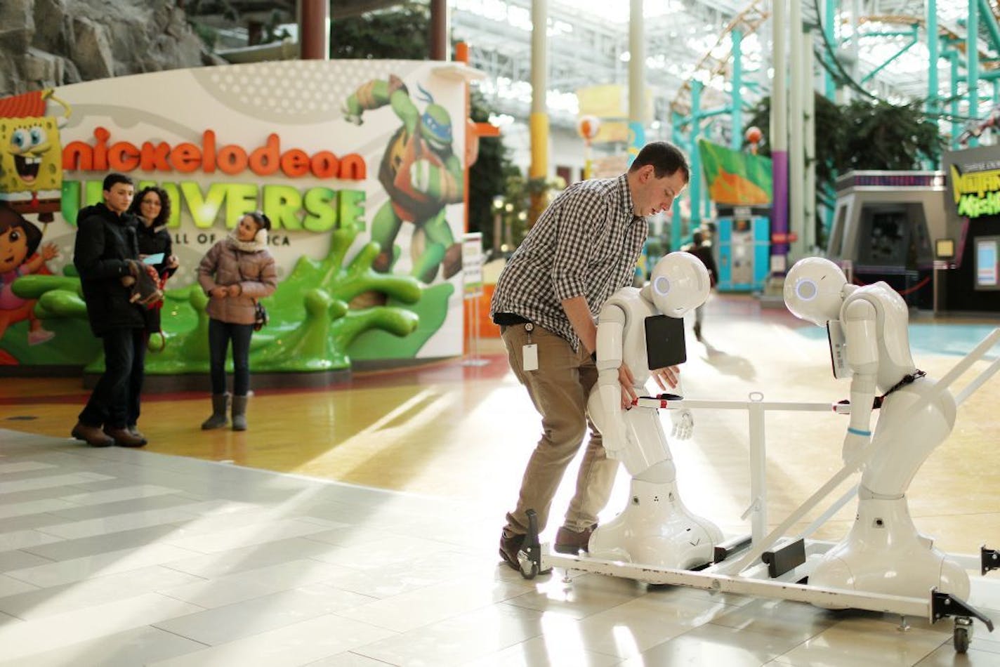 Joel Meirovitz with the Mall of America's digital marking packed a pair of Pepper humanoid robots onto a cart after at the end of their shift in the rotunda Wednesday afternoon.