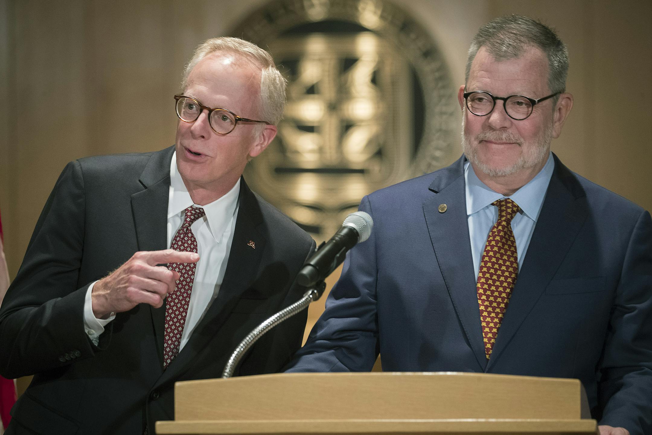 David McMillan Chair of the Board of Regents, left, and University of Minnesota President Eric Kaler took in a lighter moment after he announced to the media that he is leaving effective July 2019, during a press conference in the MacNamara Alumni Center, Friday, July 13, 2018 in Minneapolis, MN. ] ELIZABETH FLORES &#xef; liz.flores@startribune.com