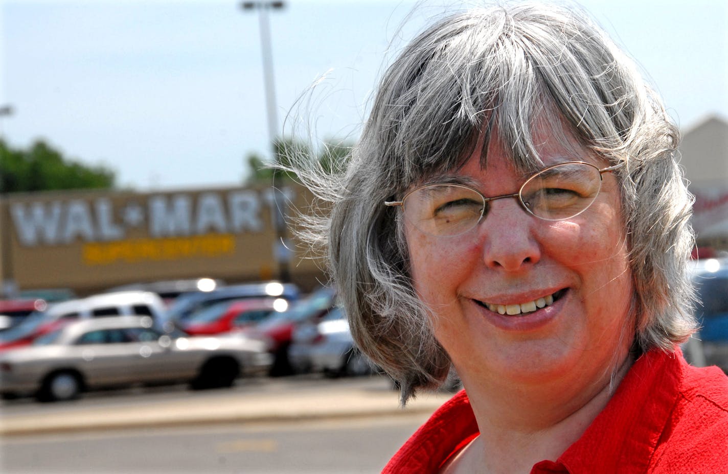 Nancy Braun, in front of a store in Rochester, is lead plaintiff in the class-action suit. She worked at a Wal-Mart in Apple Valley, where she said she repeatedly wasn't given breaks even to go to the bathroom.