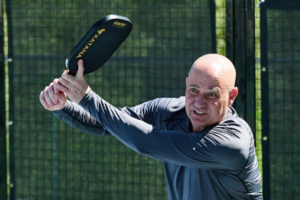 Andre Agassi plays pickleball during a training session in Las Vegas in 2023. At first, Agassi was perplexed by the pickleball craze. He just didn’t
