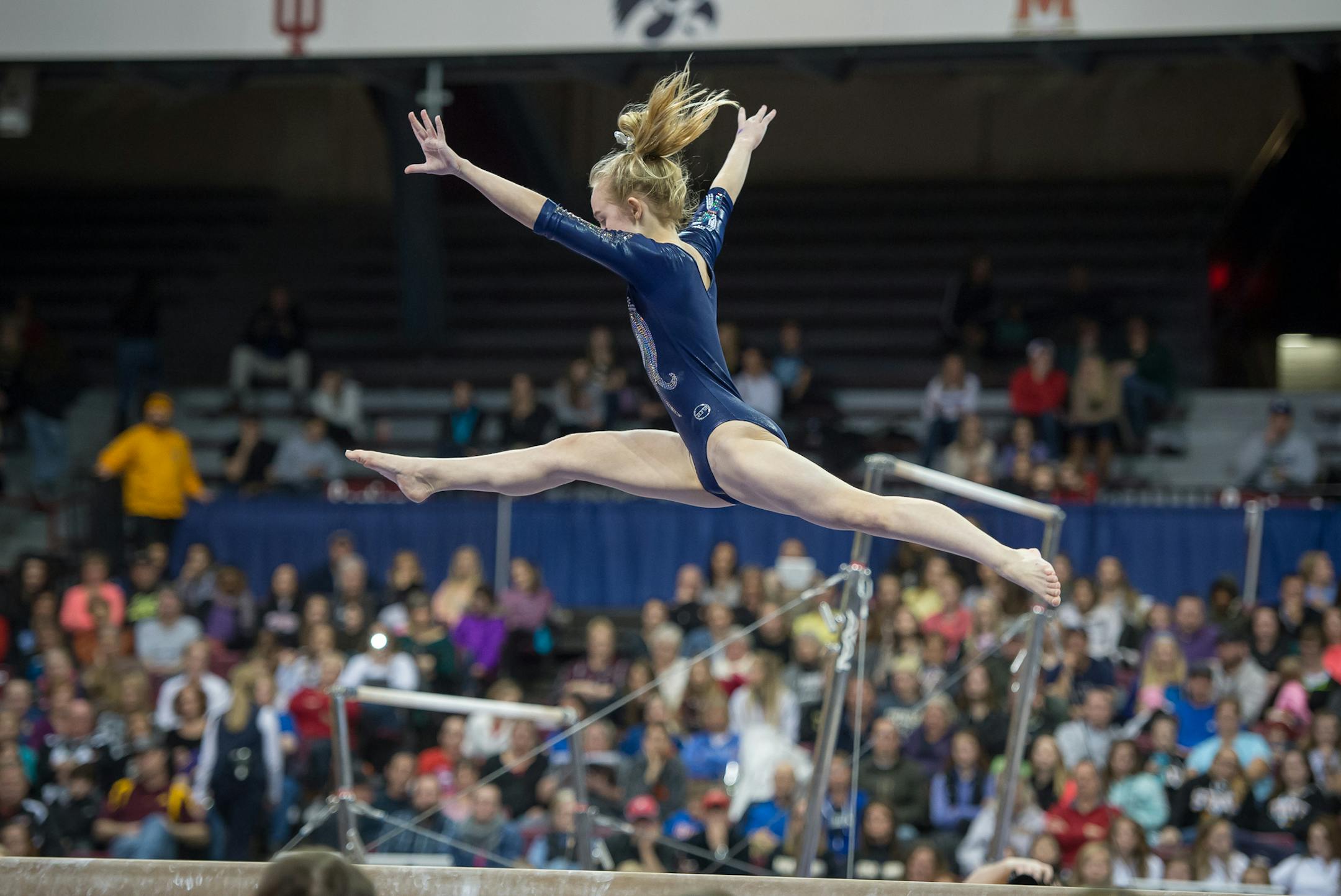 Chaney Neu, of Champlin Park, performs on the balance beam during the Minnesota State High School League Gymnastics Girls' State Meet on February 20, 2016 in Minneapolis, Minnesota.