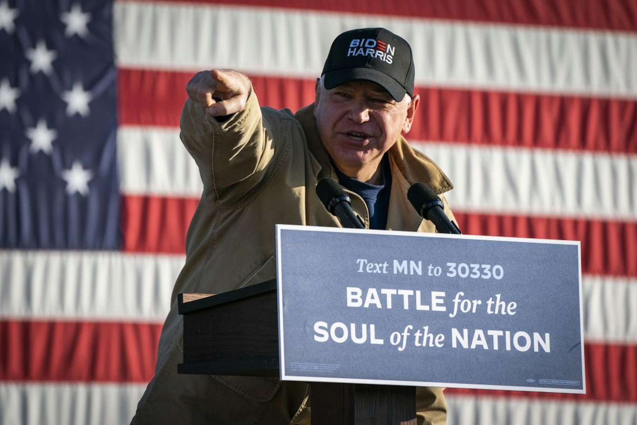 Minnesota Governor Tim Walz spoke before former Vice President Joe Biden during a drive-in campaign event in Falcon Heights.