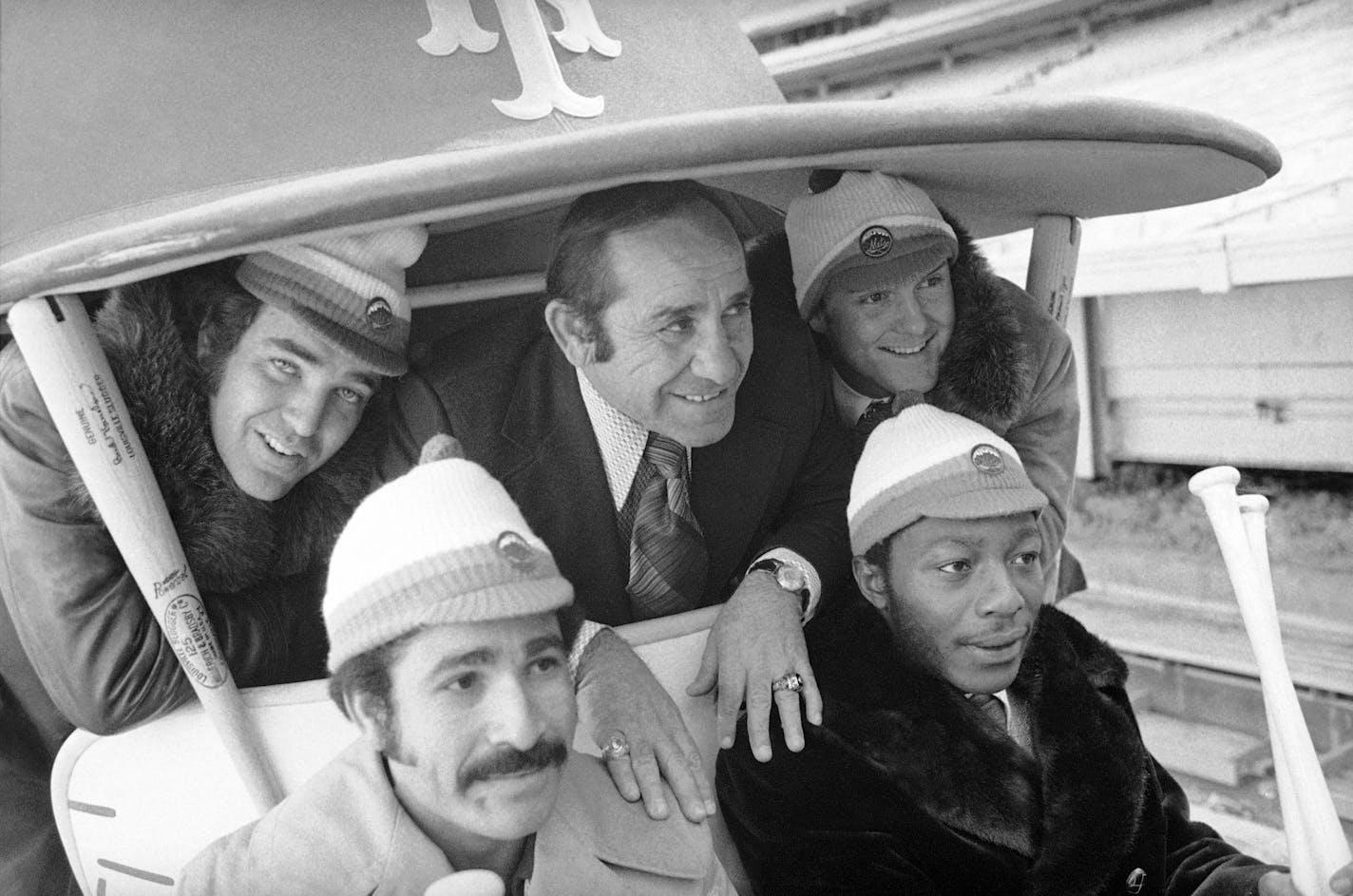 In this January 1973 photo at Shea Stadium with: Ed Kranepool, Yogi Berra, and Tug McGraw. Front row, from left: Felix Millan and John Milner. The bullpen cart will become the latest retro feature to make a return to the big leagues.