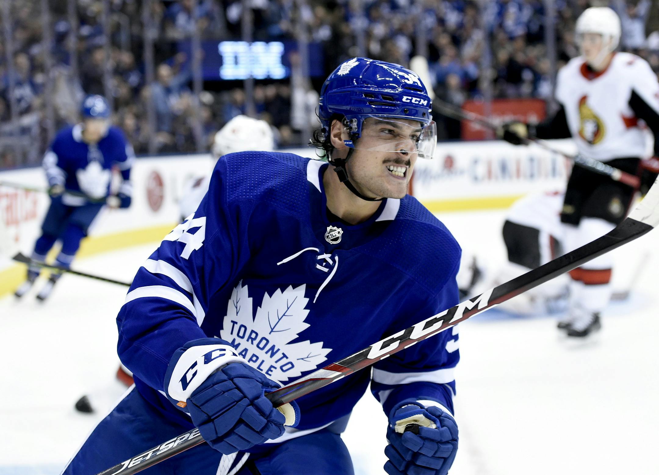Toronto Maple Leafs center Auston Matthews (34) celebrates his goal during the second period of an NHL hockey game against the Ottawa Senators Wednesday, Oct. 2, 2019 in Toronto. (Nathan Denette/The Canadian Press via AP)