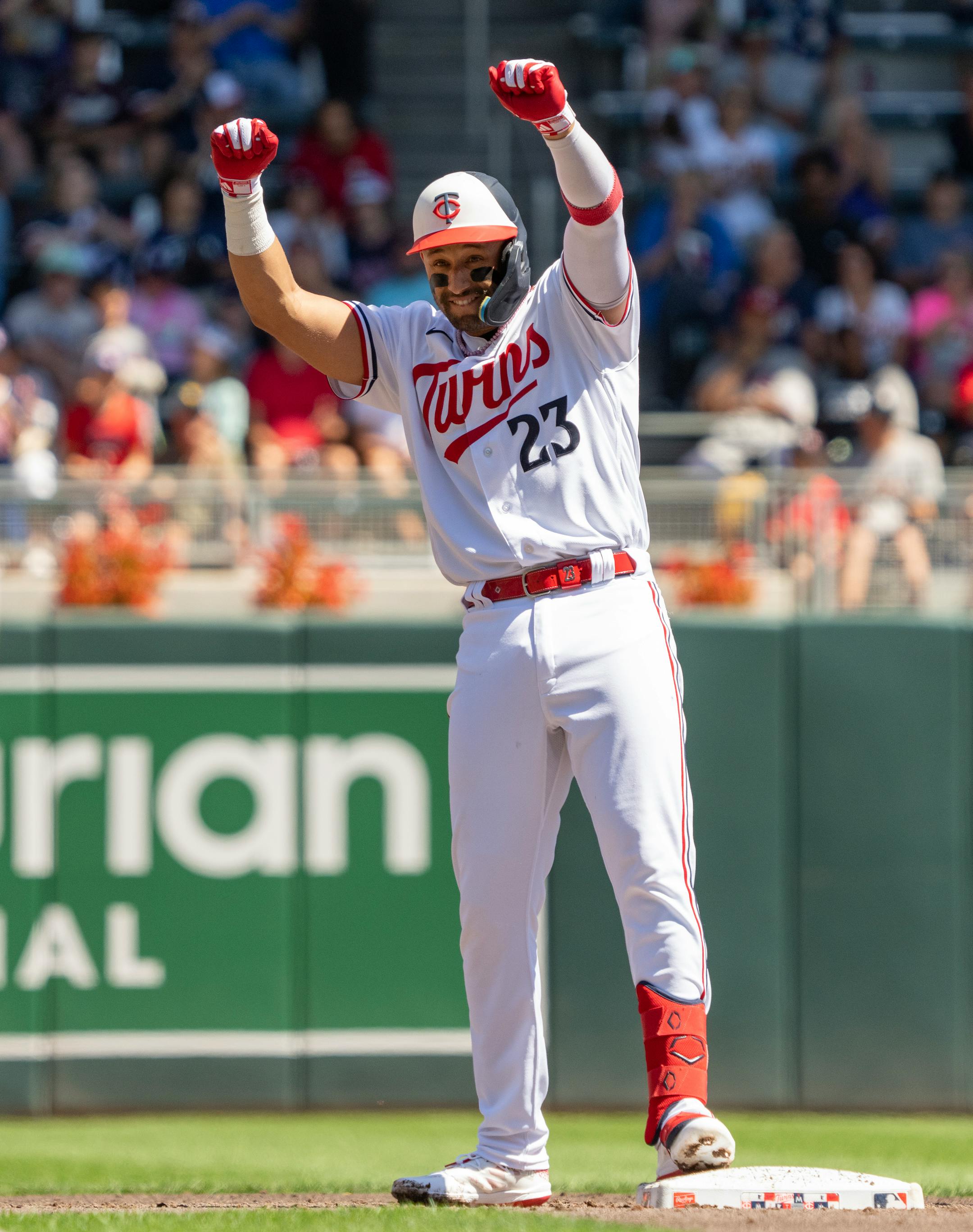 Minnesota Twins third baseman Royce Lewis (23) celebrates in second base after getting a hit in the first inning.