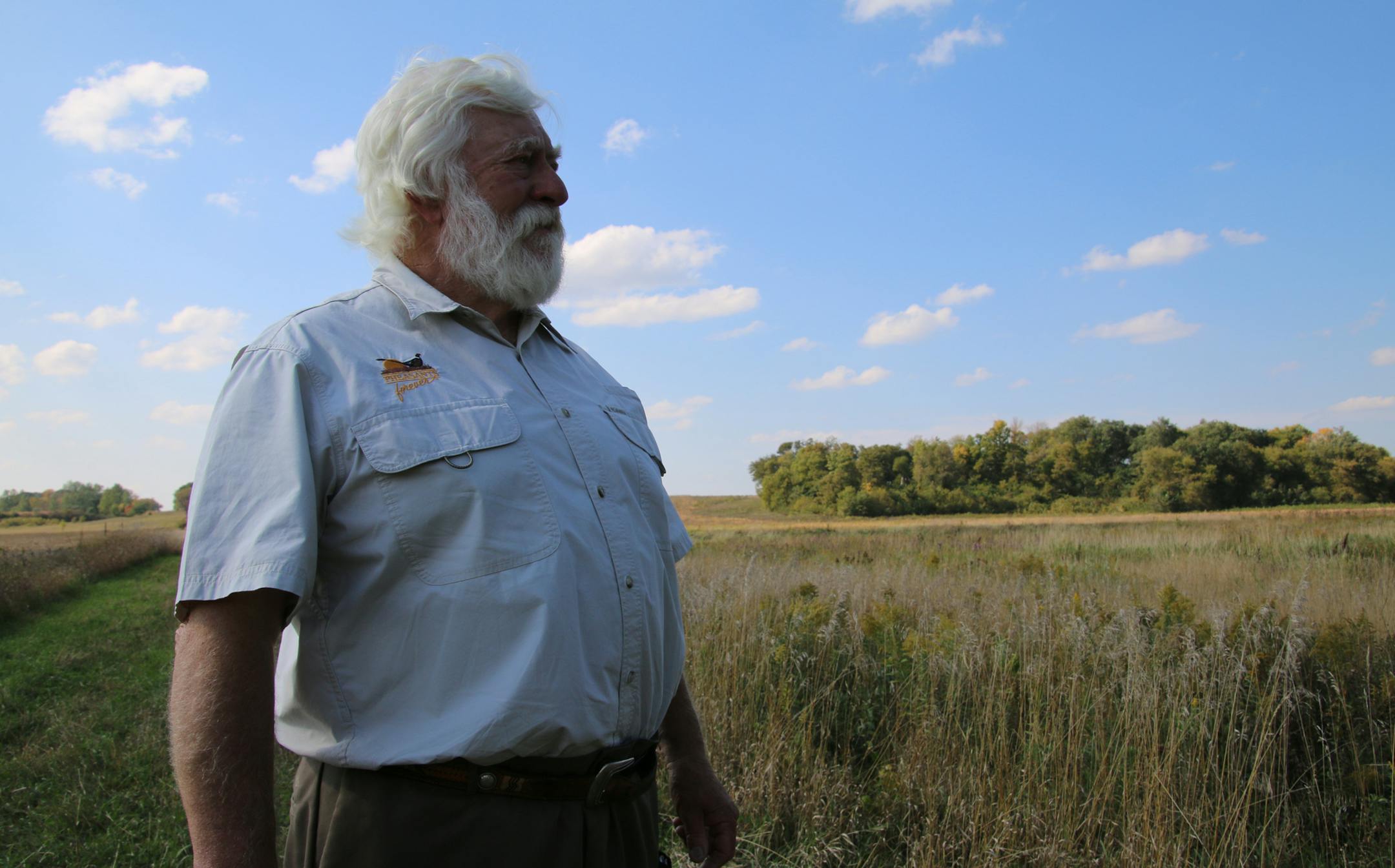Virgil Voigt, 74, of Hutchinson, a longtime conservationist, was honored for his efforts recently when officials dedicated a 112-acre addition to a state wildlife management area in McLeod County in his name. His goal: "To just leave this world a little better than we found it.'' Photos by Brad Heidel, Pheasants Forever