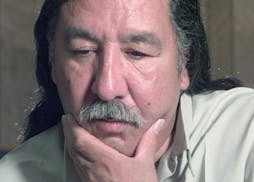 FILE - In this April 29, 1999, file photo, American Indian activist Leonard Peltier speaks during an interview at the U.S. Penitentiary at Leavenworth