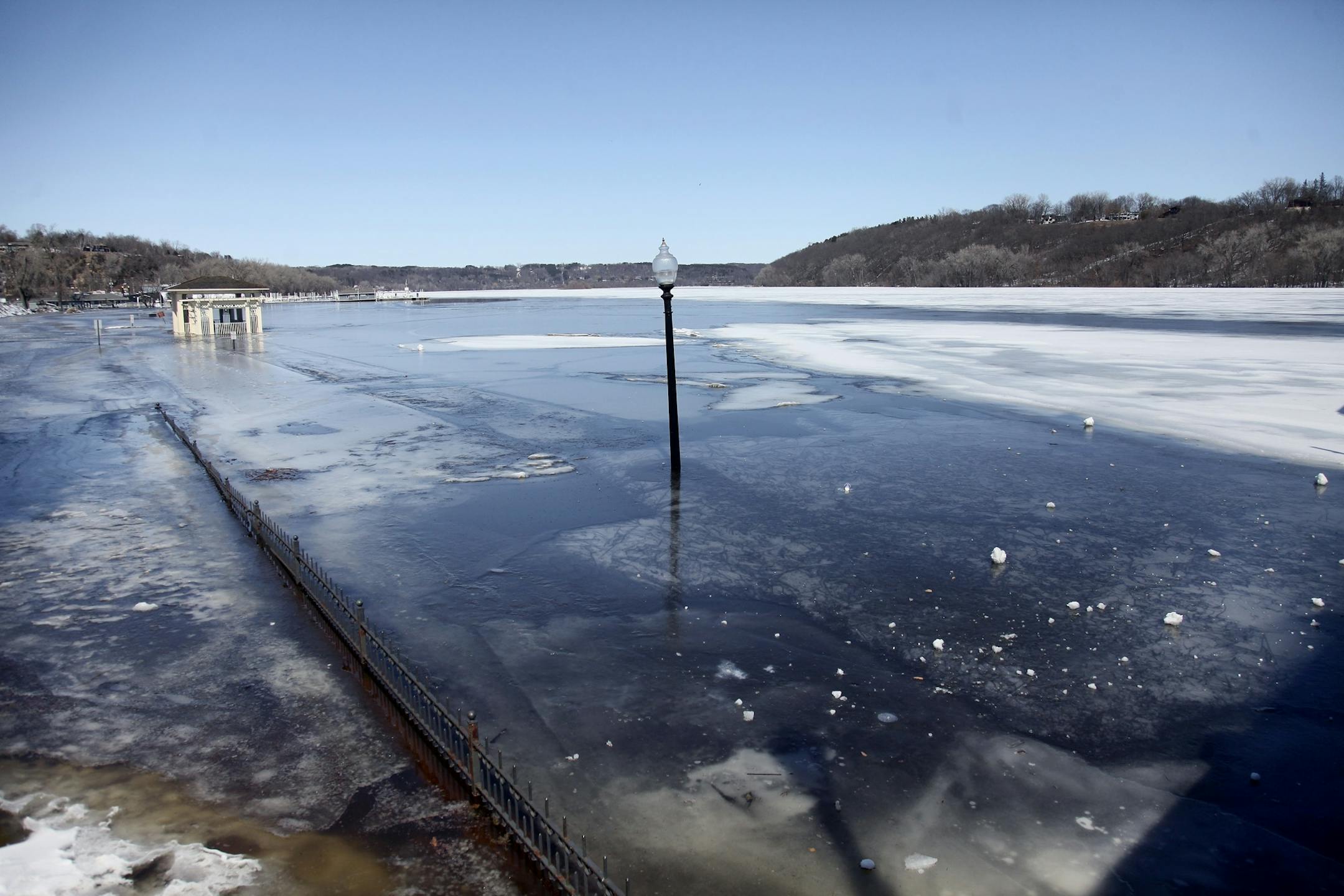 Water and ice rose beneath the Stillwater lift bridge on Monday.