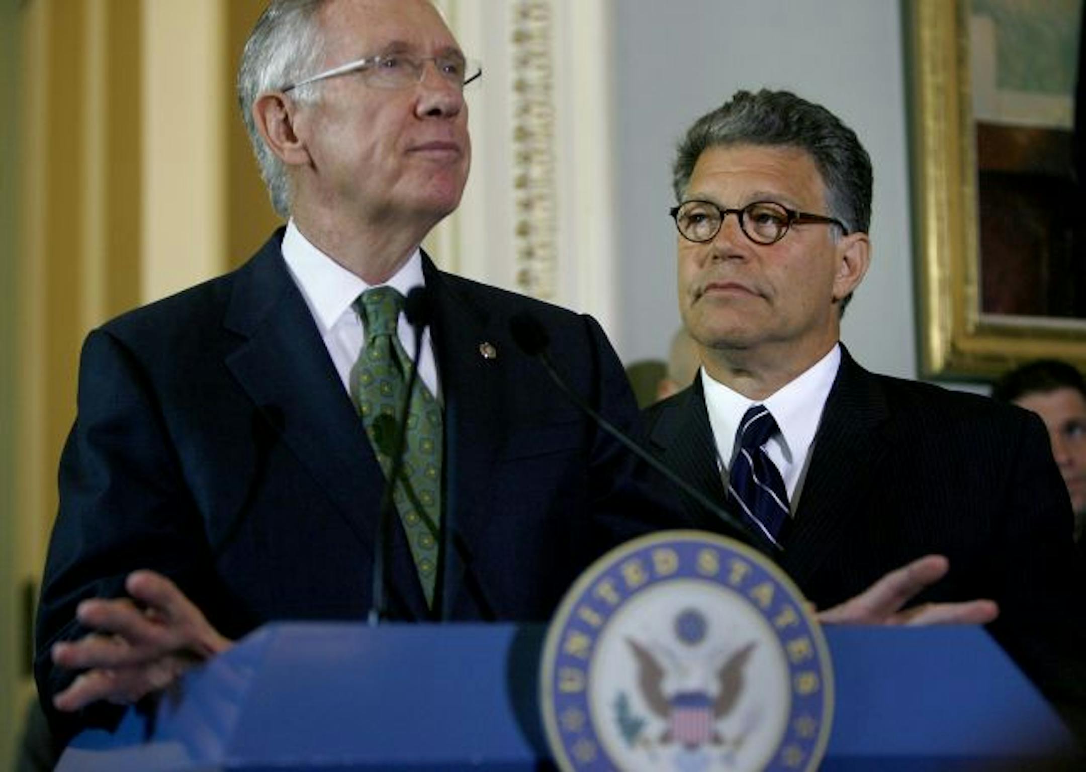 Alongside Senate Majority Leader Harry Reid, Al Franken addressed a room full of press Monday, July 6, 2009, before their first meeting since Franken's election.