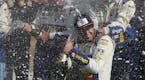 Chase Elliott celebrated his victory with his pit crew after winning a NASCAR Cup race at Watkins Glen International on Sunday.