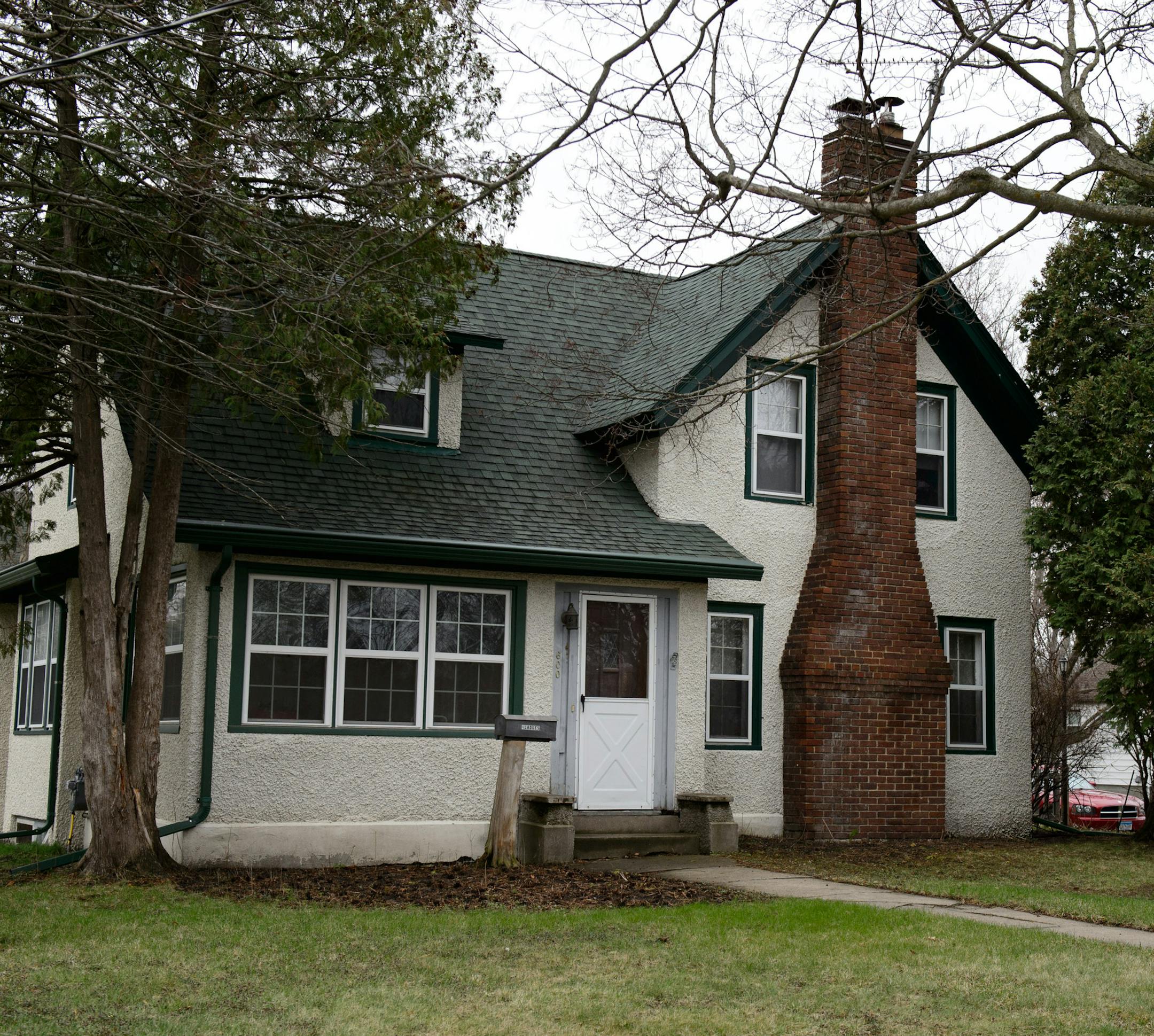 The Waseca home of John Ladue including a tree where neighbors watched him throw knives and axes at a pine tree. 17-year-old arrested in plot to kill family and massacre students at Waseca school.