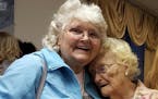 Betty Morrell, left, and her birthmother, Lena Pierce, 96, are reunited at the Greater Binghamton Airport on Jan. 15, 2016.