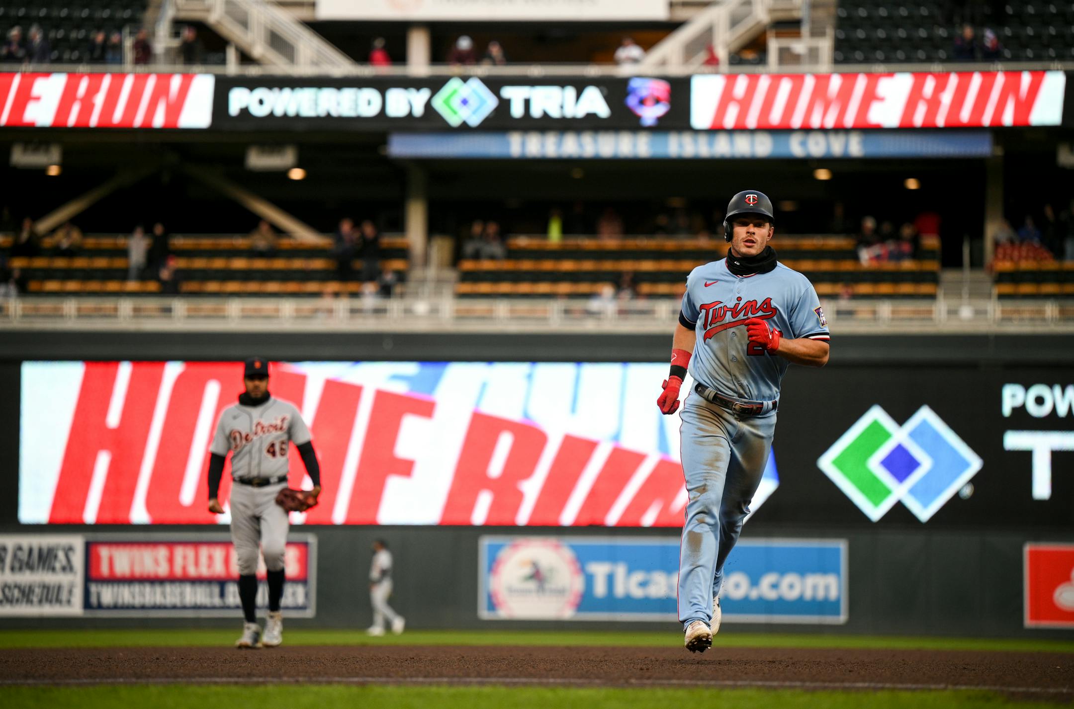 Minnesota Twins right fielder Max Kepler (26) rounds the bases after hitting a 2-run home run, bringing home third baseman Gio Urshela (15), in the bottom of the fourth inning.