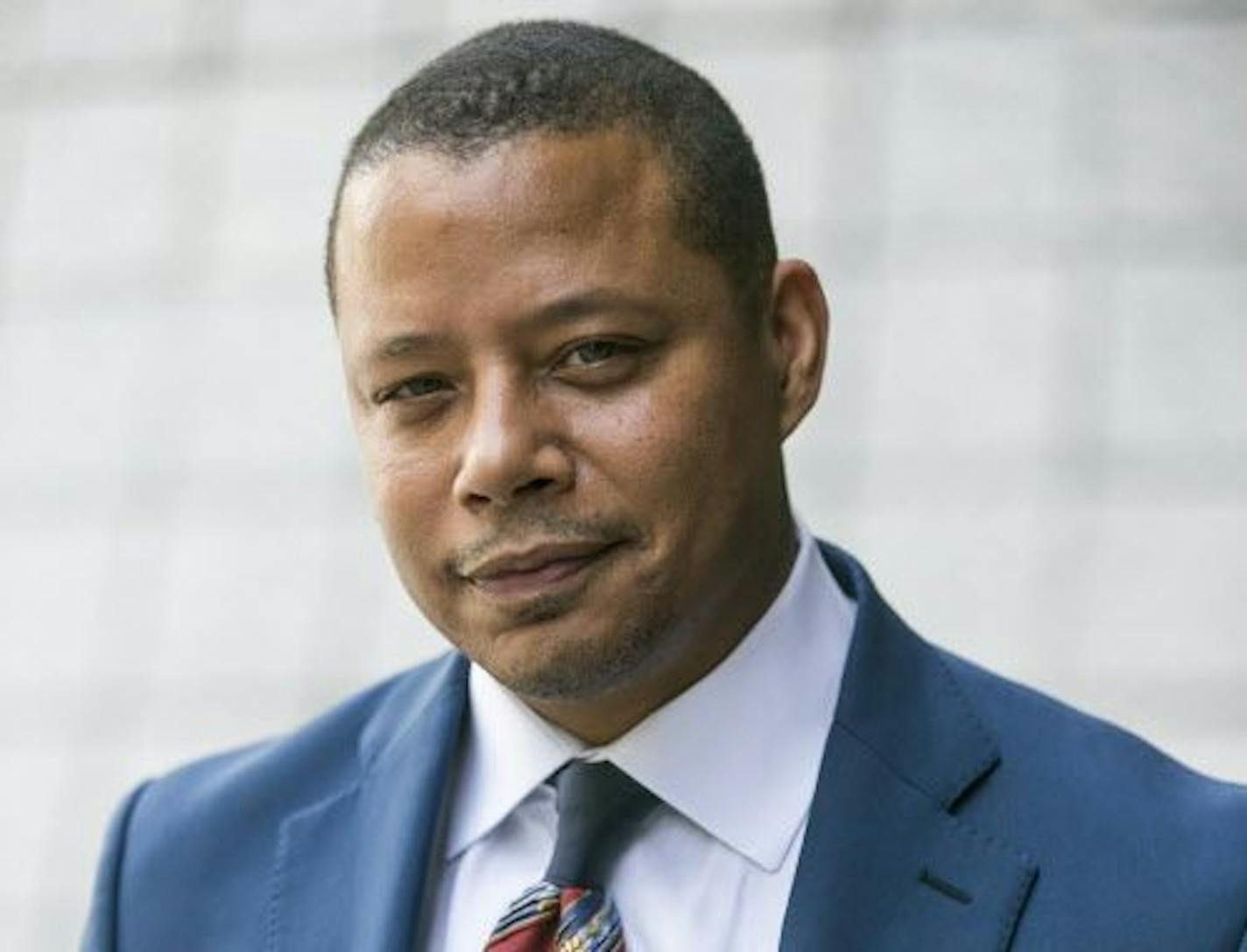 FILE - In this Thursday, Aug. 13, 2015 file photo, actor Terrence Howard walks into a Los Angeles court for a hearing on a divorce settlement with his ex-wife Michelle Ghent, in Los Angeles. Howard spent four days at the hearing, recounting threats he claims Ghent made to leak private information about him, and facing questions about arrests and accusations of violence dating back 15 years. A judge is scheduled to rule on Monday, Aug. 24, 2015, on whether the Oscar-nominated actor can overturn t