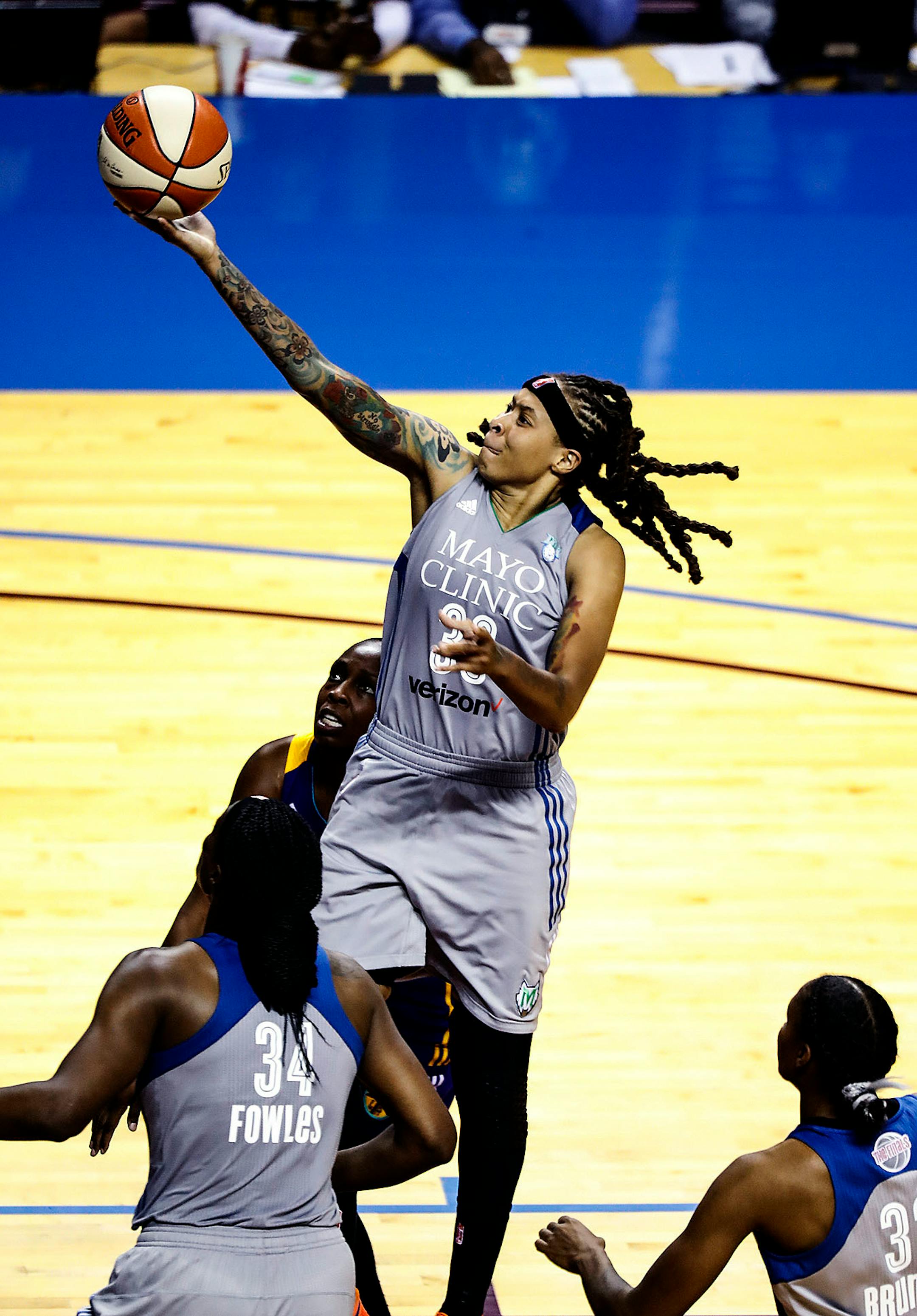 Minnesota Lynx guard Seimone Augustus (33) went for a shot in the second half. The Sparks won 85-84.