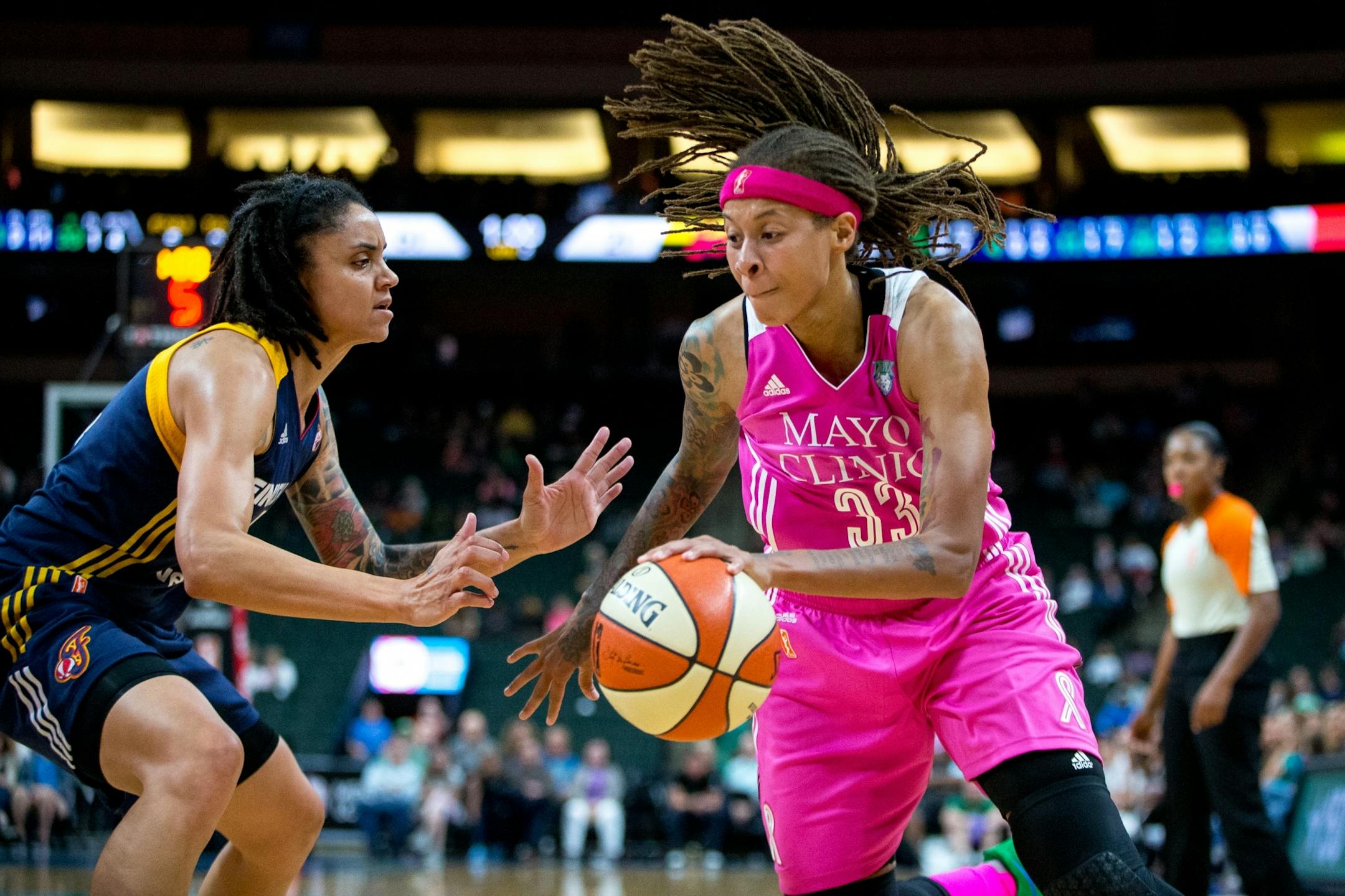Minnesota Lynx guard Seimone Augustus takes the ball past Indiana Fever�s Candice Dupree during the first half on Friday, Aug. 18, 2017, at Xcel Energy Center.