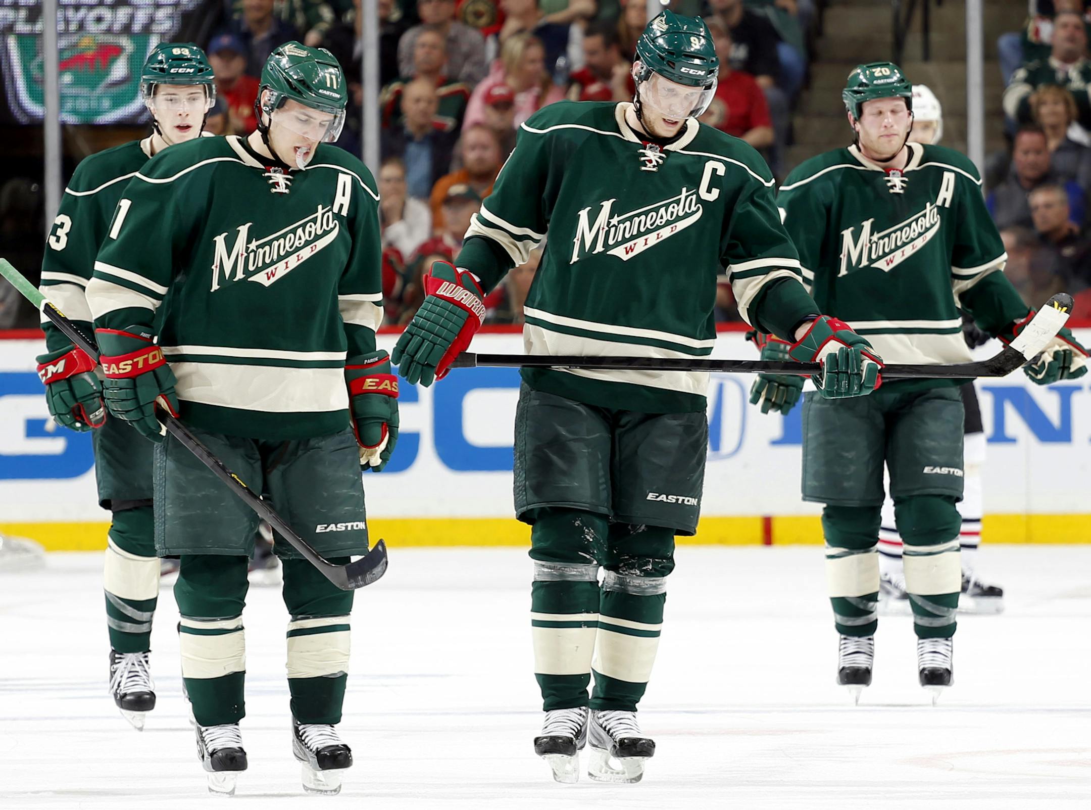 The Wild’s top line — from left, Charlie Coyle, Zach Parise and Mikko Koivu — and top defenseman, Ryan Suter, wore the look of dejection during the Game 4 loss.