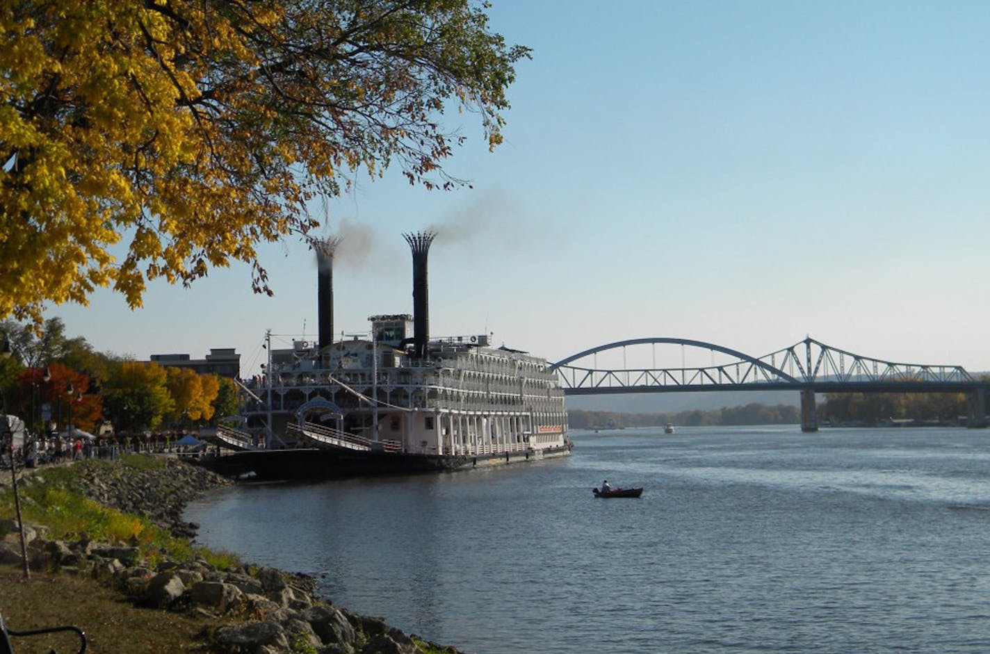 Caption on the steamboat picture is: photo courtesy of La Crosse Area Convention & Visitors Bureau Info on this one: Visiting steamboat, the American Queen, is the largest steamboat ever built. The shot is of the Queen on the Mississippi with with Riverside Park on the left. Steamboat information gathered from the Explore LaCrosse website - http://www.explorelacrosse.com/2013-steamboat-shore-stop-schedule/) and The American Queen website: http://www.americanqueensteamboatcompany.com/american_que