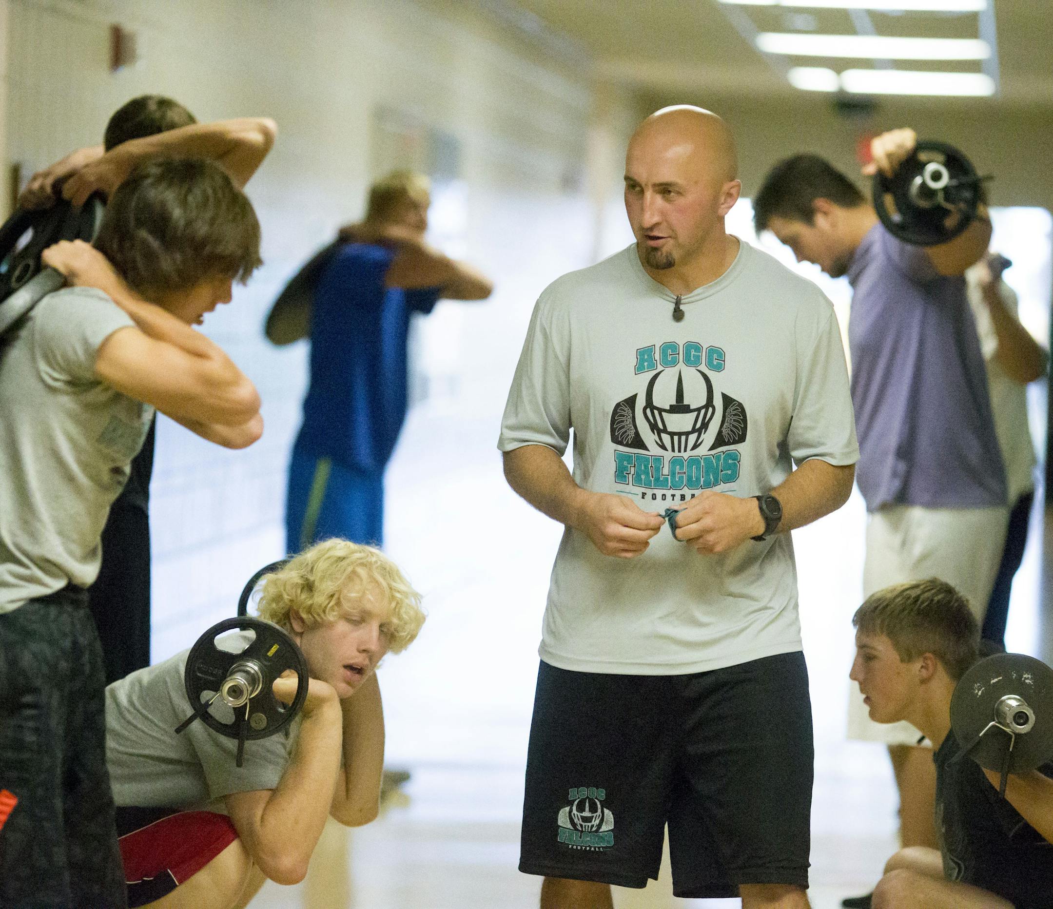 Coach David Blom during practice at Atwater-Cosmos-Grove High School in Grove City, Minn., on Monday October 5, 2015. ] RENEE JONES SCHNEIDER • reneejones@startribune.com The coach of the Atwater-Cosmos-Grove City football team in central MN is focusing on more than Xs and Os. He's taking his team through some unusual non-athletic exercises to help them become respectful, responsible men, especially to women.