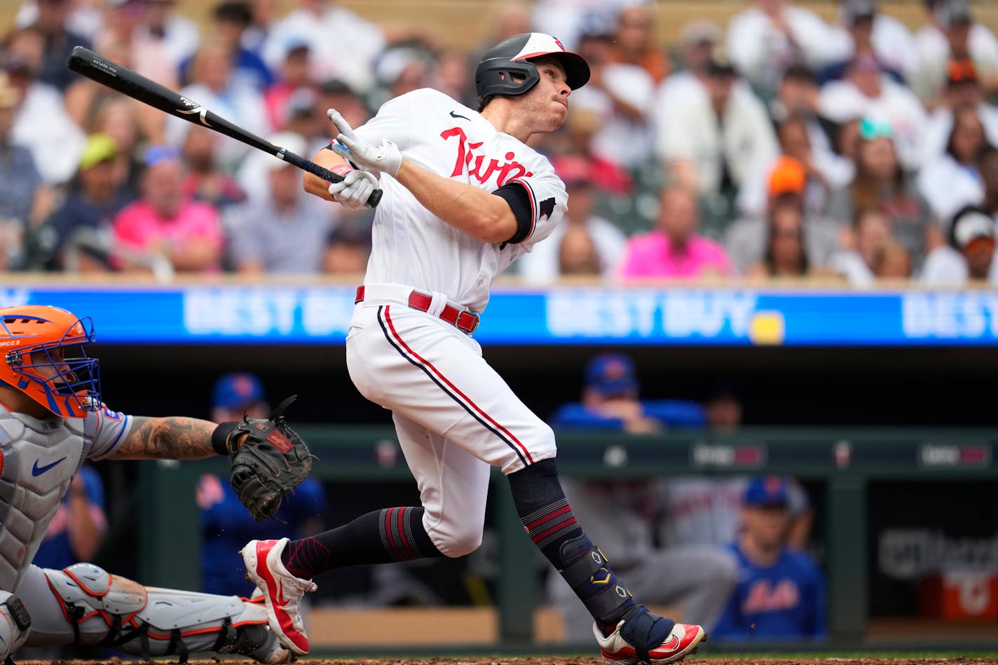 Max Kepler follows through on his three-run triple during the seventh inning Saturday.